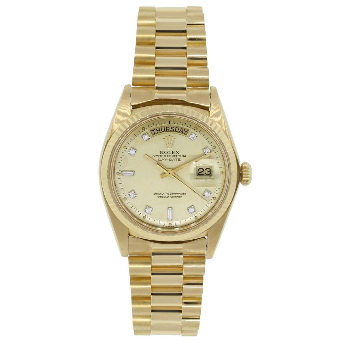 Brand: Rolex
MPN: 1803
Model: Day-Date
Case Material: 18k Yellow Gold
Case Diameter: 36mm
Crystal: Plastic
Bezel: 18k yellow gold fluted bezel
Dial: Yellow gold diamond day date dial (aftermarket)
Bracelet: Presidential bracelet (aftermarket)
Size: