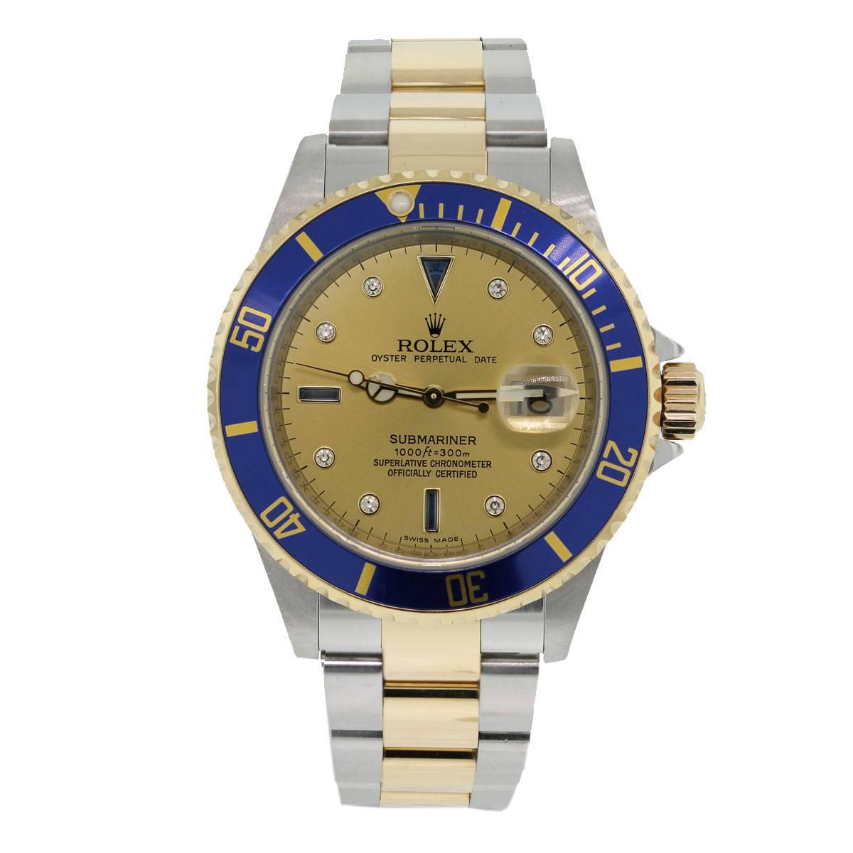 Brand: Rolex
Style: Submariner
MPN: 16613
Serial: "A" Serial
Case Material: Stainless steel
Case Diameter: 40mm
Bezel: Unidirectional 18k yellow gold bezel with blue insert
Dial: Champagne diamond and blue sapphire serti dial