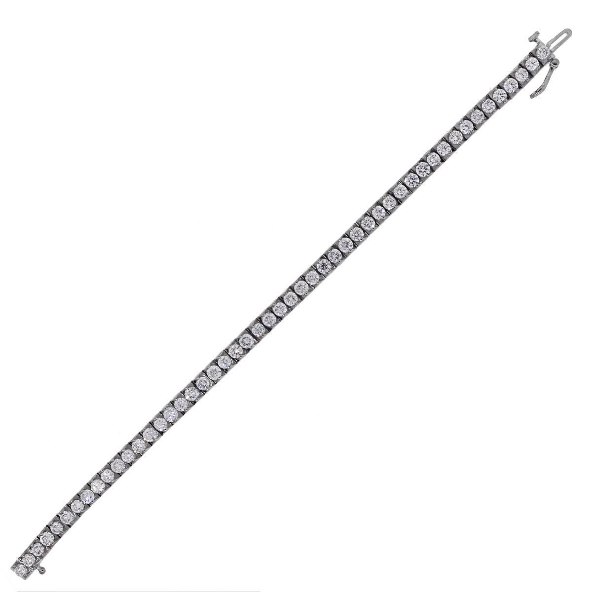 Material: 14k white gold
Diamond Details: Approximately 7ctw of round brillaint cut diamonds. Diamonds are G/H in color and VS in clarity.
Clasp: Tongue in box clasp with safety lock
Total Weight: 20.0g (12.9dwt)
Measurements: Will fit a 7"