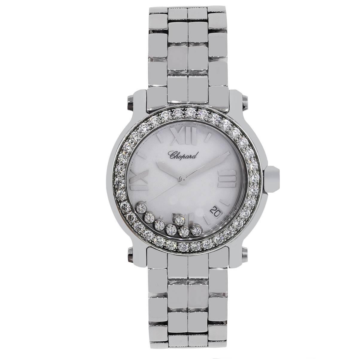 Brand: Chopard
MPN: 8475
Model: Happy Sport
Case Material: Stainless steel
Case Diameter: 36mm
Crystal: Scratch resistant sapphire
Bezel: Fixed stainless steel diamond bezel
Dial: White dial with roman numeral hour markers with floating diamonds.