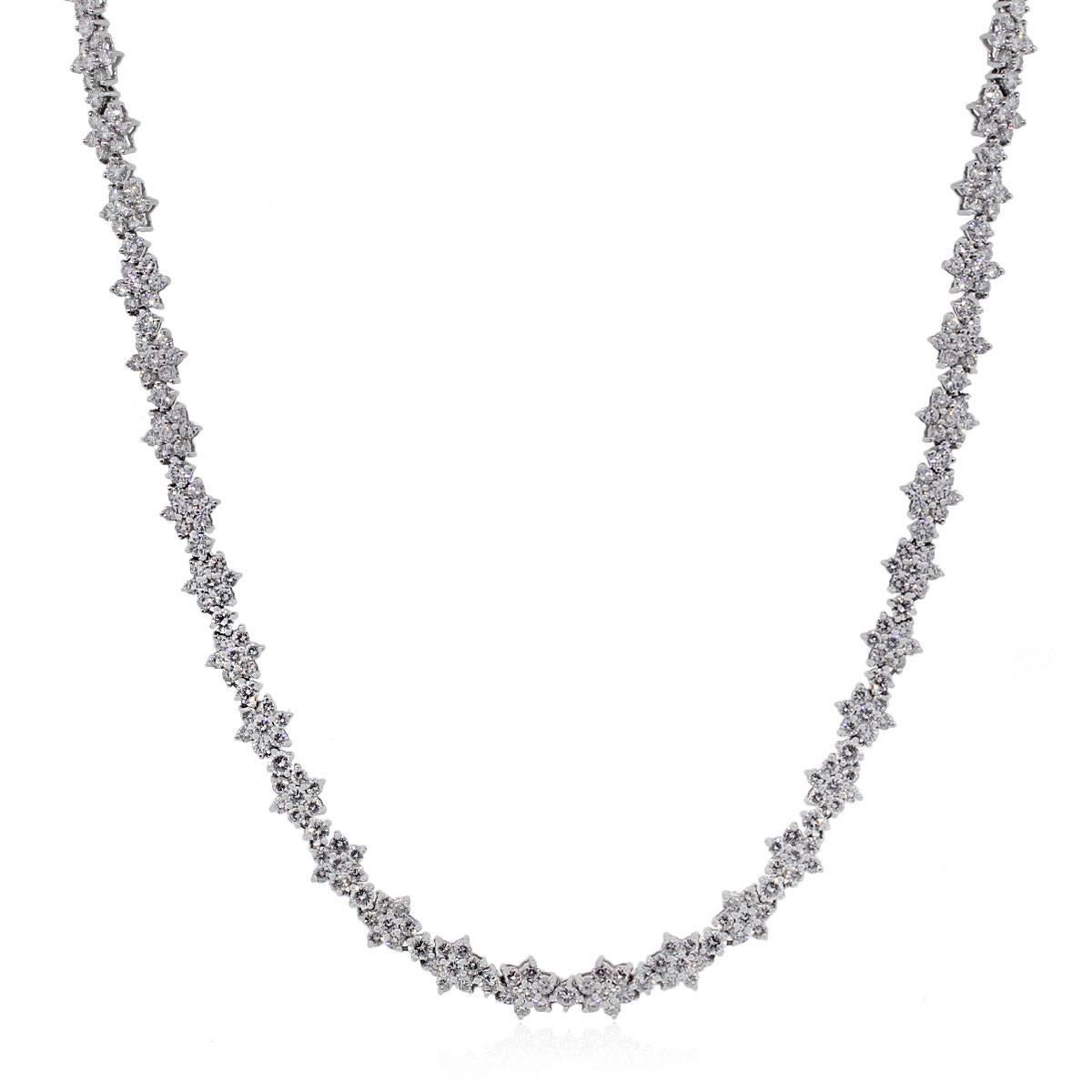 Material: Platinum
Style: Floral diamond necklace
Diamond Details: Approximately 14.90ctw round brilliant diamonds. Diamonds are G/H in color and VS in clarity.
Measurements: Necklace is 17