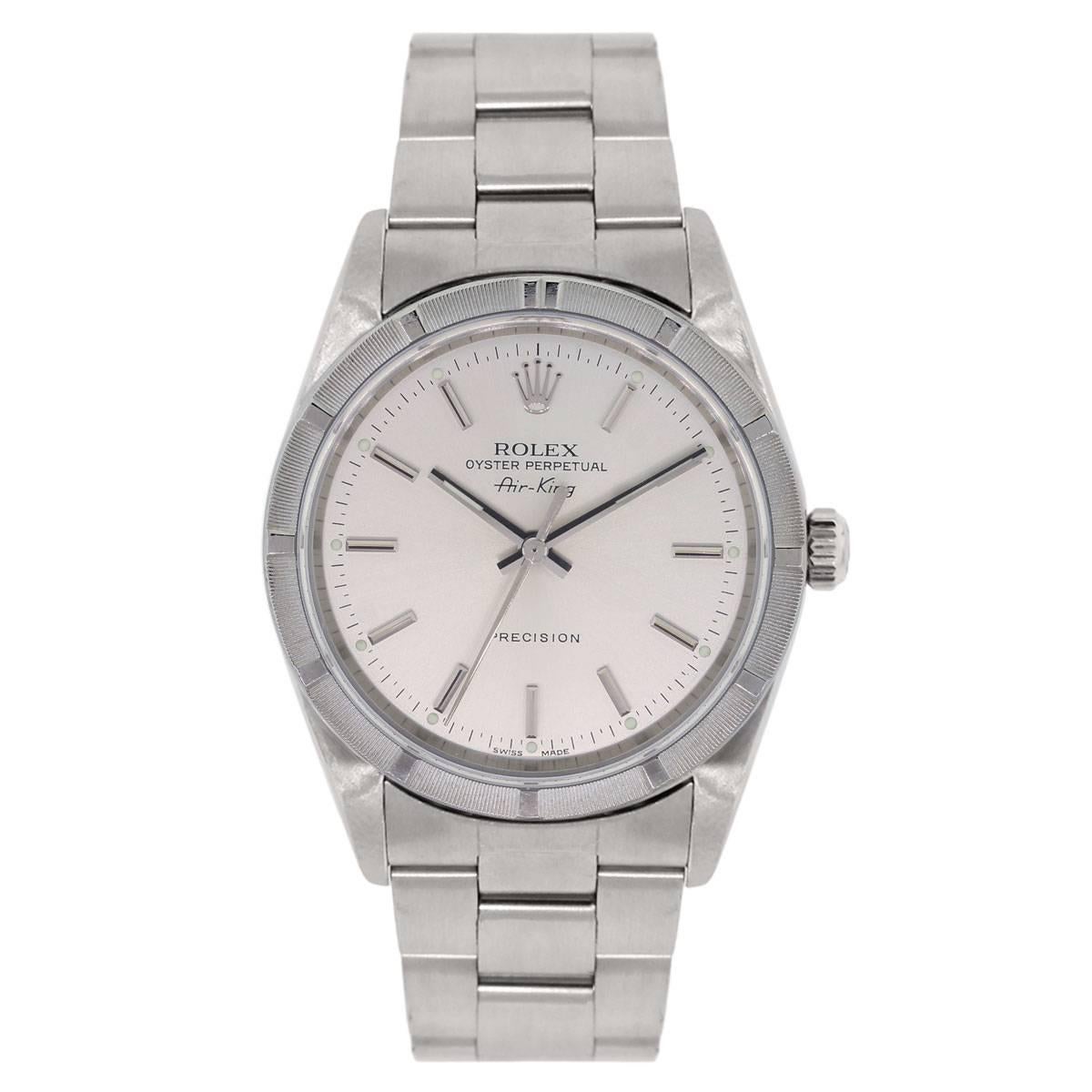 Brand: Rolex
MPN: 1410M
Model: Air King
Case Material: Stainless steel
Case Diameter: 34mm
Crystal: Sapphire crystal
Bezel: Stainless steel engine turned bezel
Dial: White stick dial
Bracelet: Stainless steel oyster band
Size: Will fit a 6.75"