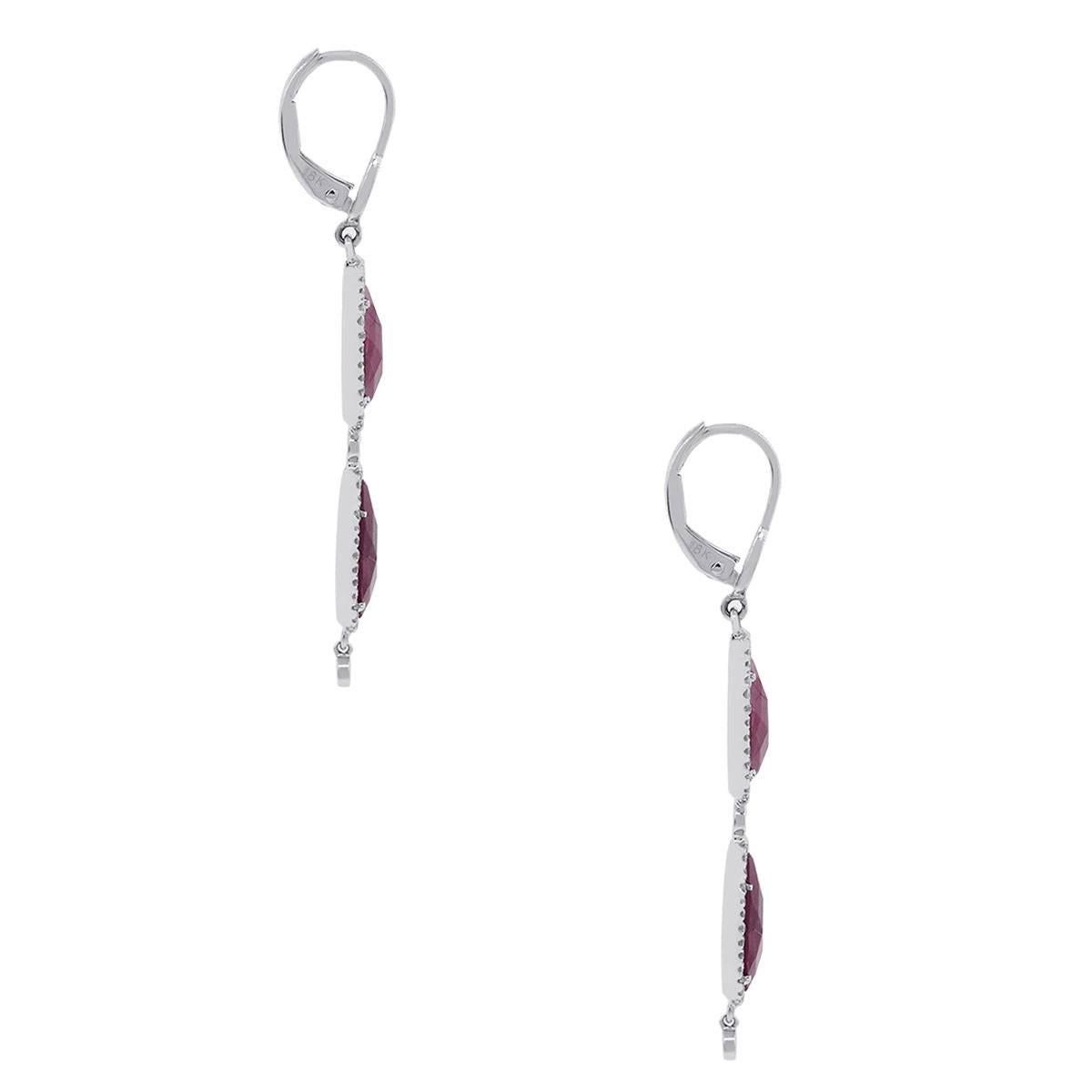 Designer: Meira T
Style: Ruby and diamond earrings
Material: 18k White Gold
Diamond Details: Approximately 0.51ctw of round brilliant diamonds. Diamonds are G/H in color and SI in clarity
Gemstone Details: Approximately 6.15ctw ruby gemstones
Size: