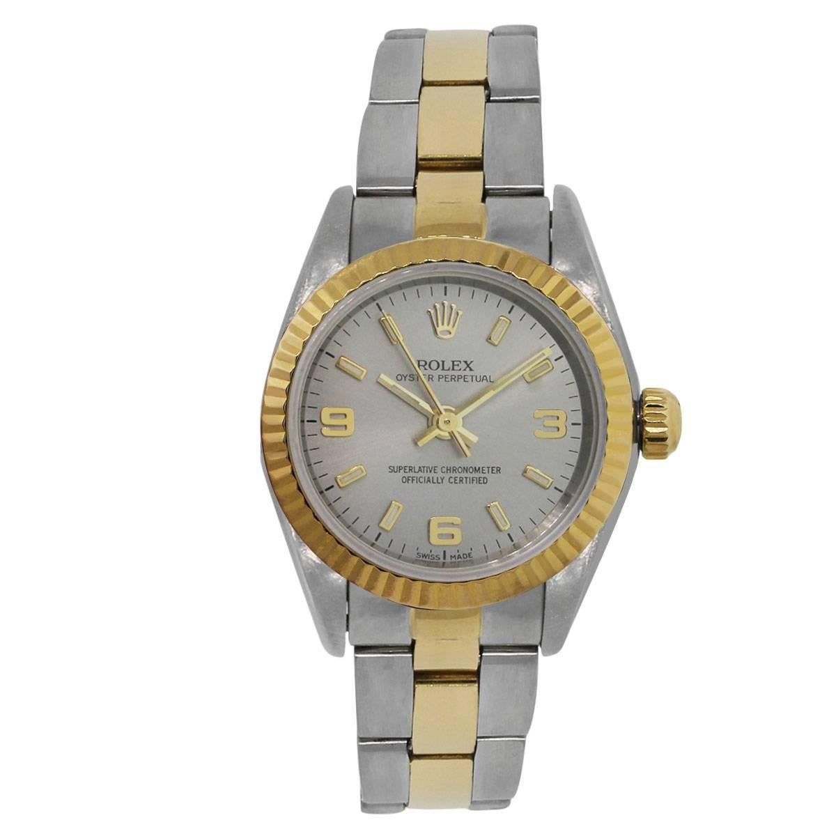 Brand: Rolex
MPN: 76193
Model: Oyster perpetual non-date
Case Material: Stainless & 18k
Case Diameter: 24mm
Crystal: Scratch resistant sapphire
Bezel: 18k yellow gold fixed fluted bezel
Dial: Silver dial with yellow gold hour, minute and second