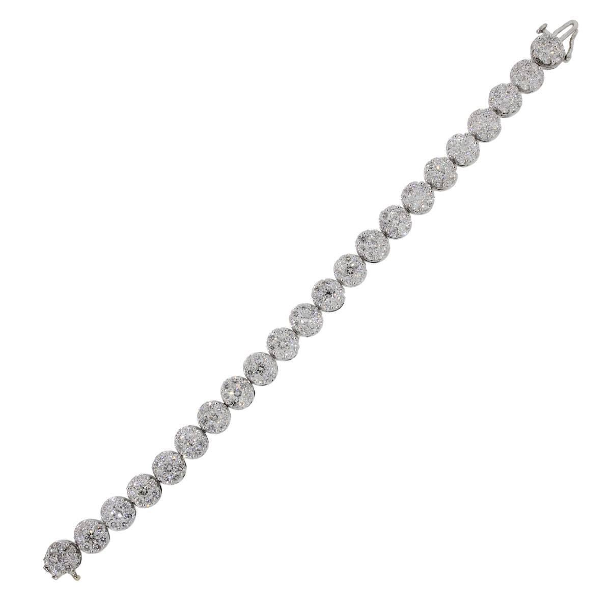 Material: 14k white gold
Diamond Details: Approximately 9ctw of round brilliant diamonds. Diamonds are G/H in color and SI in clarity
Clasp: Tongue in box clasp with safety lock
Total Weight: 18.6g (12dwt)
Measurements: 6.50″ in length
Additional