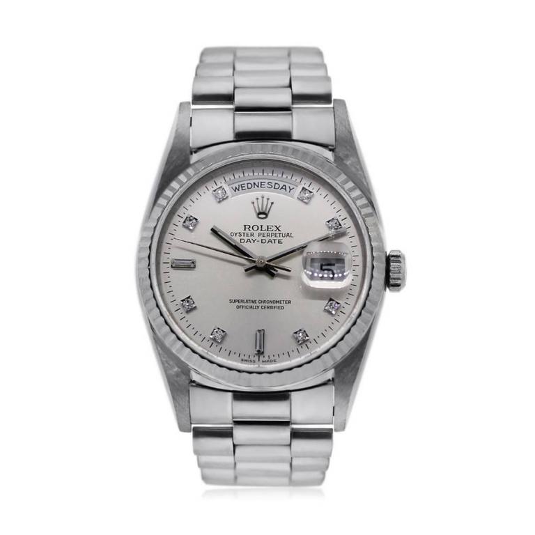 rolex day date platinum on wrist