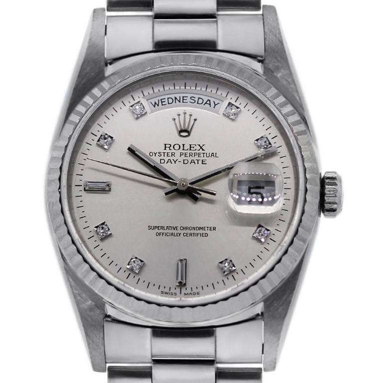 rolex day date platinum on wrist