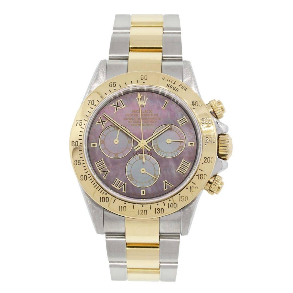Brand: Rolex
MPN: 116523
Model: Daytona
Case Material: Stainless steel
Case Diameter: 40mm
Crystal: Scratch resistant sapphire
Bezel: 18k yellow gold fixed bezel
Dial: Tahitian mother of pearl roman chronograph dial (factory)
Bracelet: Two tone