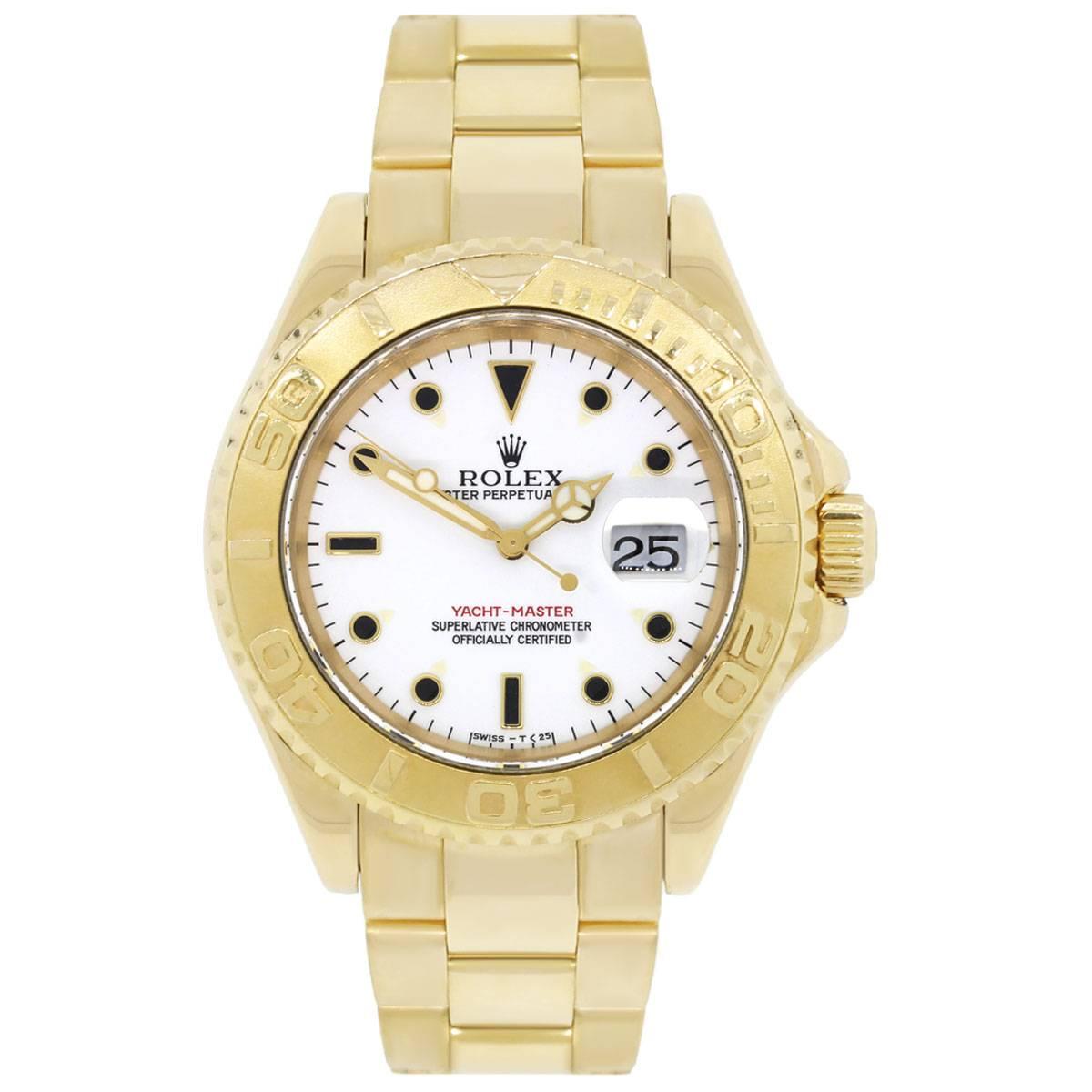 Brand: Rolex
MPN: 16628
Model: Yachtmaster
Case Material: 18k yellow gold
Case Diameter: 40mm
Crystal: Sapphire crystal (scratch resistant)
Bezel: 18k yellow gold bidirectional bezel
Dial: White dial with black hour markers, gold hands and date