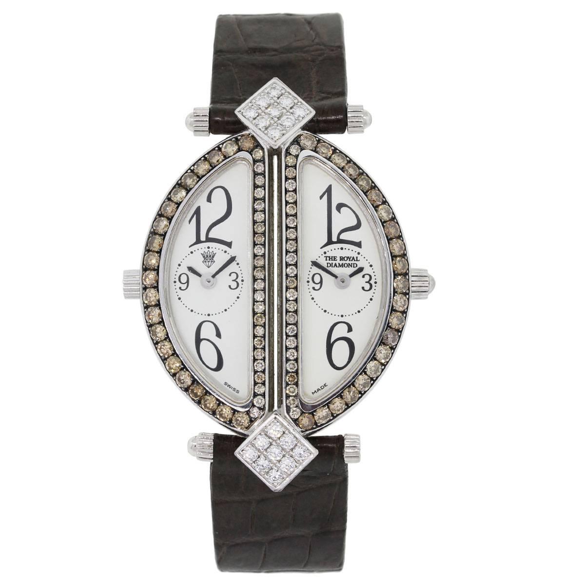 Brand: The Royal Diamond
MPN: BA812
Model: Double
Case Material: 18k white gold
Case Diameter: 30mm x 44mm
Crystal: Sapphire crystal
Bezel: Diamond bezel. Diamonds are cognac in color and VS in clarity. White diamonds are G/H in color and VS in