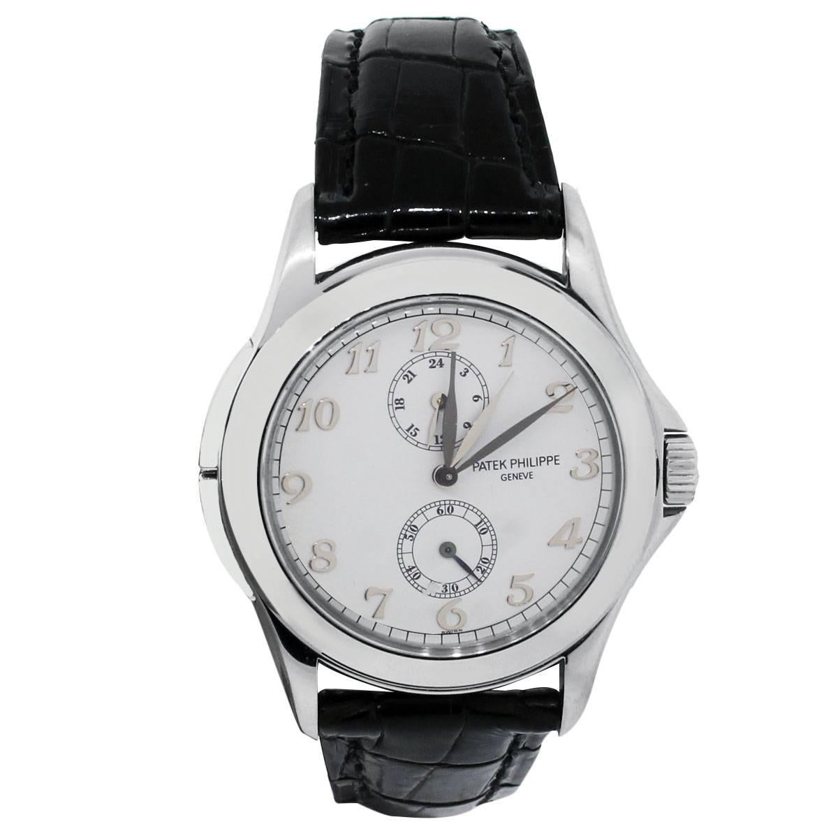 Brand: Patek Philippe
MPN: 5134
Model: Travel Time
Case Material: 18k white gold
Case Diameter: 38mm
Crystal: Sapphire crystal (scratch resistant)
Bezel: 18k white gold smooth bezel
Dial: White dial with white gold hour markers and hands. Sub dial