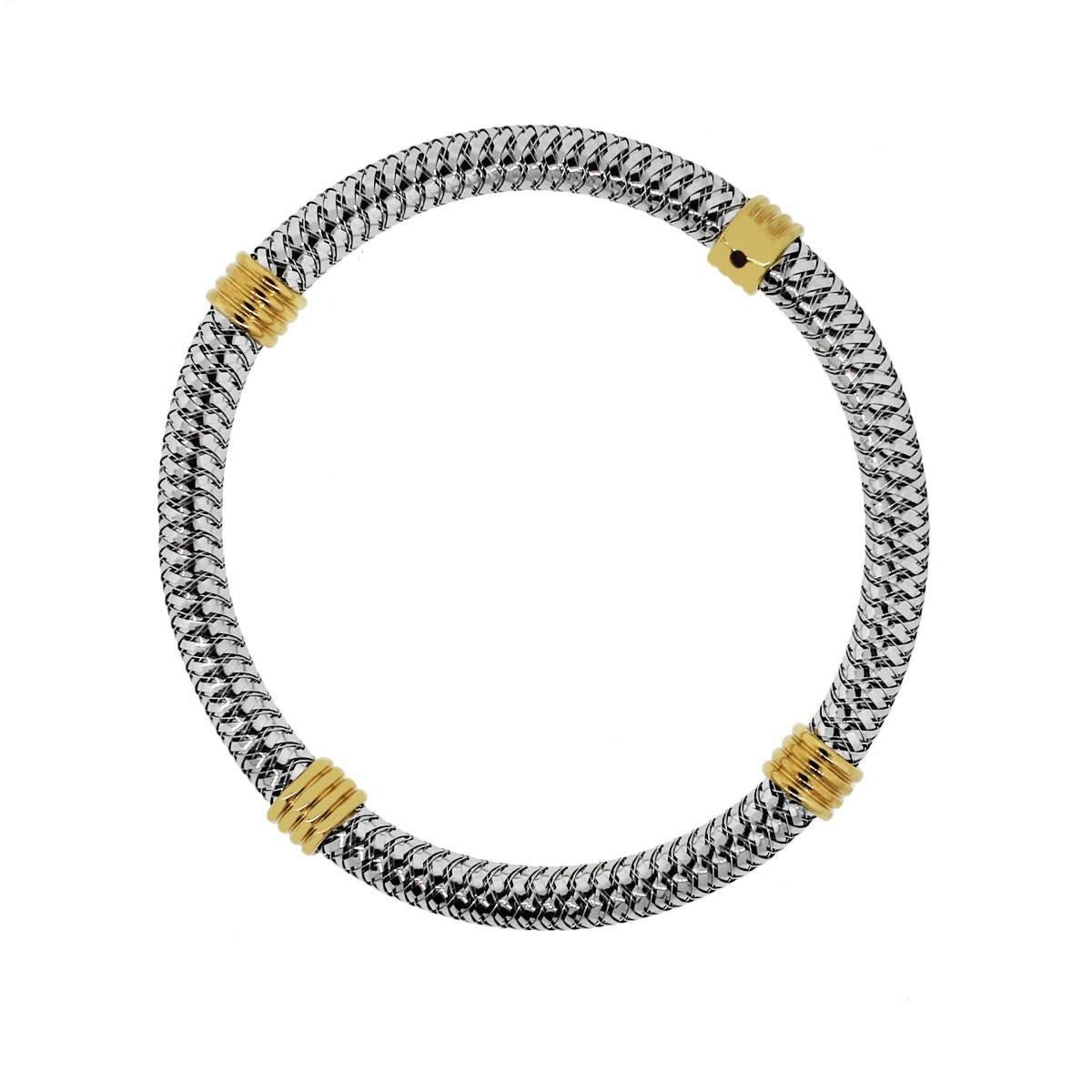Brand: Roberto Coin
Style: 4 Station bangle
Material: 18k White Gold and yellow gold
Total Weight: 16.2g (10.4dwt)
Bracelet Length: 6.5″
Clasp: No clasp. Flexible bangle
Additional Details: This item comes with a Raymond Lee Jewelers presentation