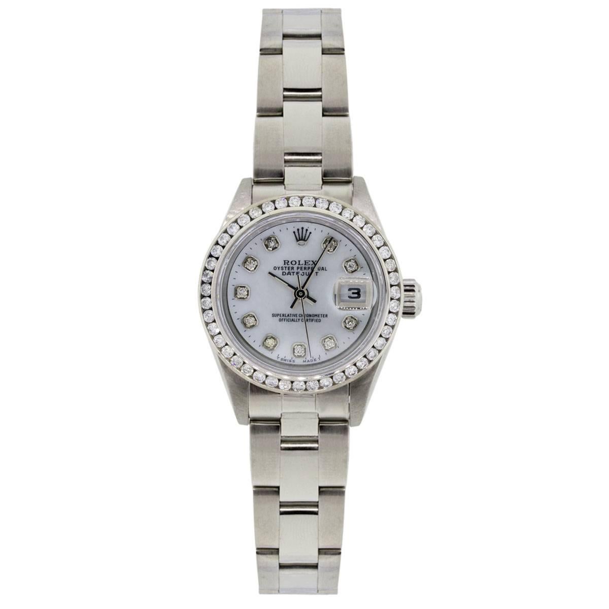 Brand: Rolex
MPN: 79174
Model: Datejust
Case Material: Stainless steel
Case Diameter: 26mm
Crystal: Sapphire crystal
Bezel: Custom Diamond bezel
Dial: Custom Mother of Pearl diamond dial with date window at 3 o’clock position
Bracelet: Stainless