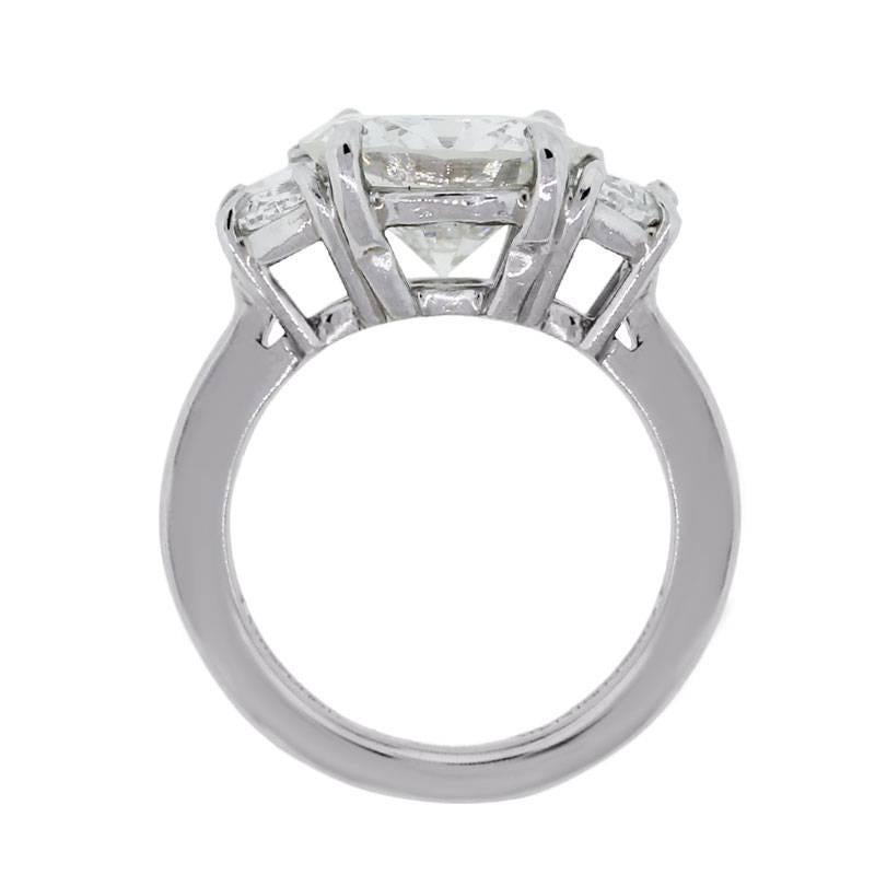 Material: 14k White Gold
Center Diamond Details: GIA certified 3.45ct round brilliant diamond. Diamond is I in color and SI2 in clarity
Diamond Details: Approximately 2ctw of half moon shape diamonds. Diamonds are H in color and VS2 in clarity
Ring