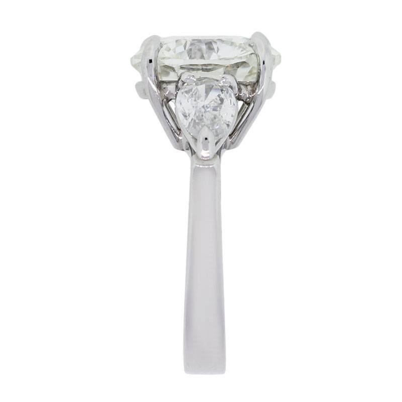 Material: Platinum
Center Diamond Details: GIA certified 5.03ct round brilliant diamond. Diamond is L in color and SI1 in clarity
Diamond Details: Approximately 0.70ctw of pear shape diamonds. Diamonds are G/H in color and VS in clarity
Ring Size: 4