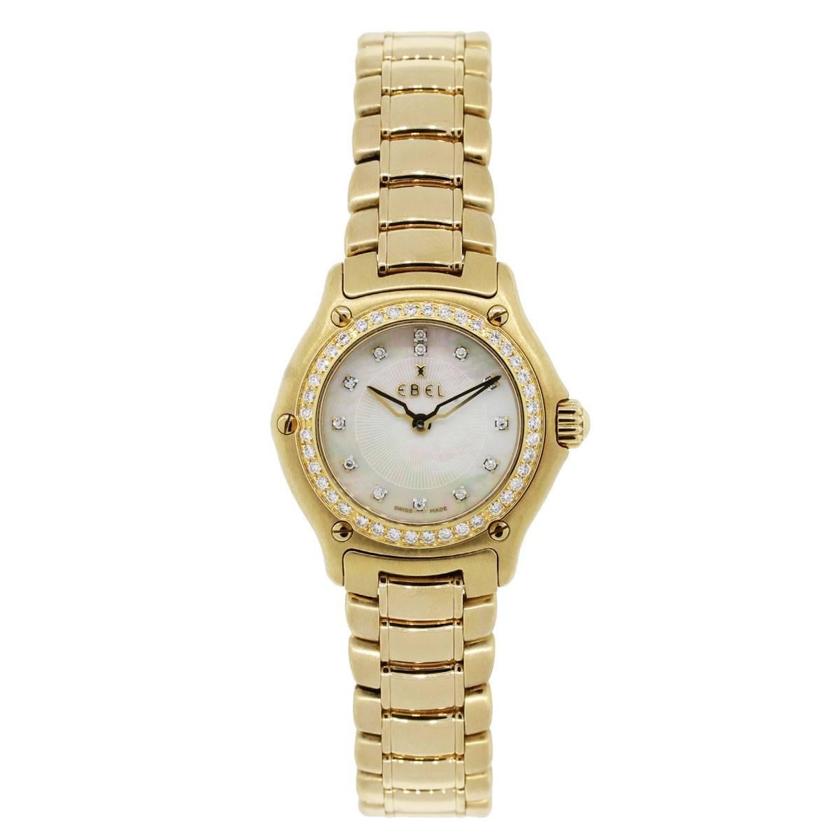 Brand: Ebel
MPN: 80901214
Model: 1911
Case Material: 18k yellow gold
Case Diameter: 26mm
Crystal: Sapphire crystal
Bezel: Diamond bezel
Dial: Mother of pearl diamond dial with gold hands
Bracelet: 18k yellow gold
Size: Will fit a 6″ wrist
Clasp: