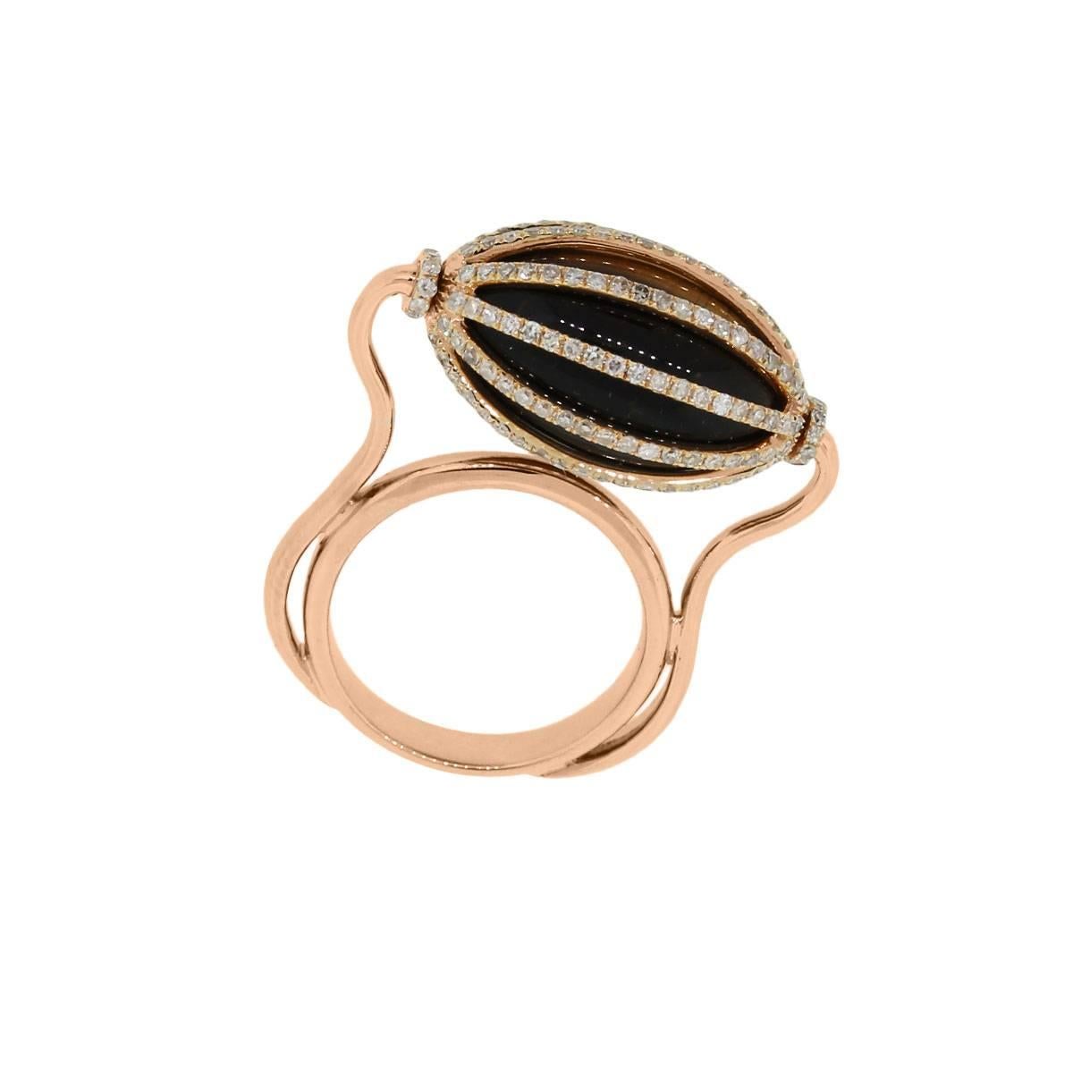 Material: 18k rose gold
Diamond Details: Approximately 1ctw round brilliant diamonds. Diamonds are G in color and VS in clarity
Gemstone Details: Tiger’s eye
Ring Measurements: 1.31″ x 0.51″ x 1.06″
Ring Size: 6
Total Weight: 11.3g