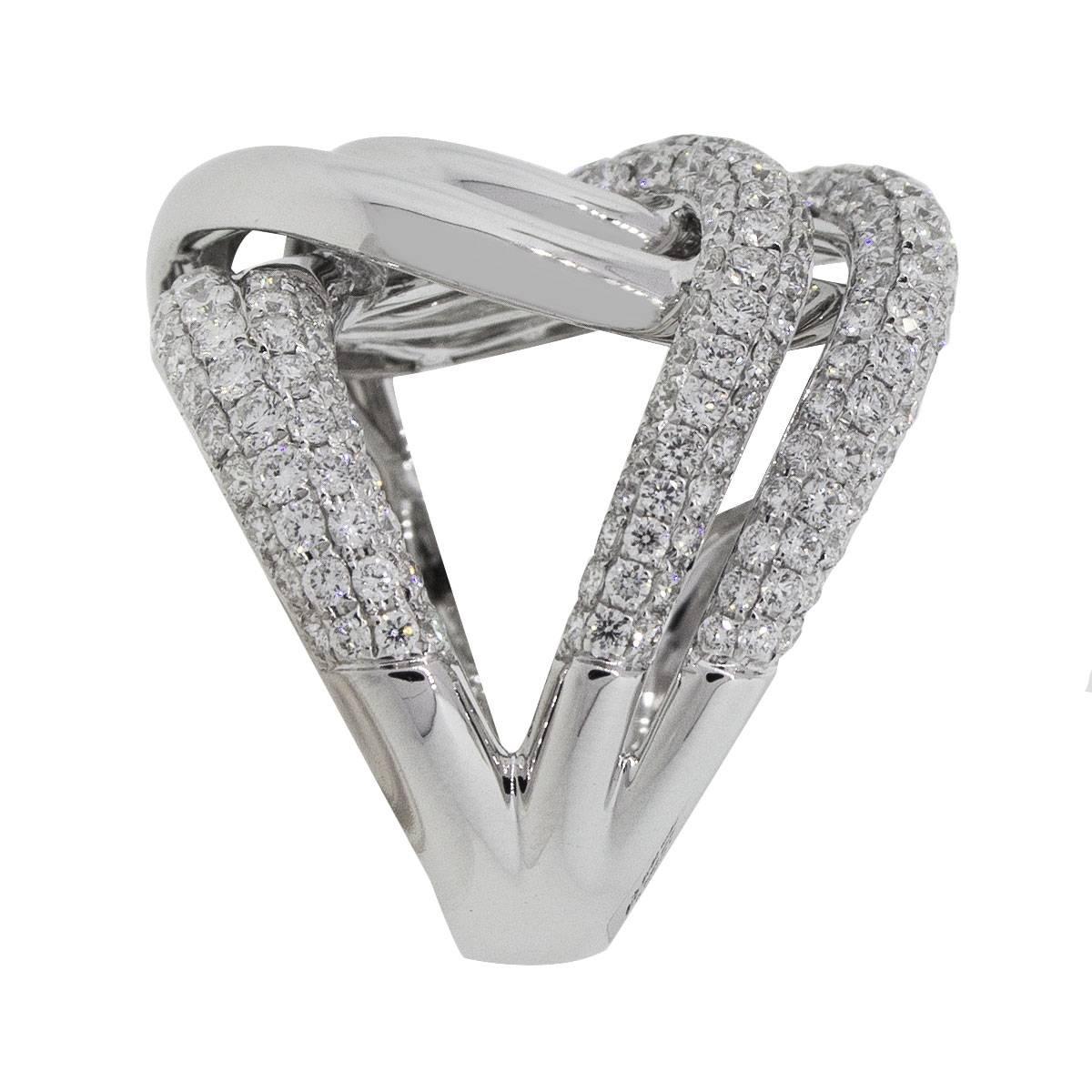Material: 18k white gold
Diamond Details: Approximately 2.57ctw of round brilliant diamonds. Diamonds are G/H in color and VS in clarity.
Size: 6.5
Total Weight: 15.4g (9.9dwt)
Measurements: 1″ x 0.80″ x 1″
Additional Details: This item comes with a