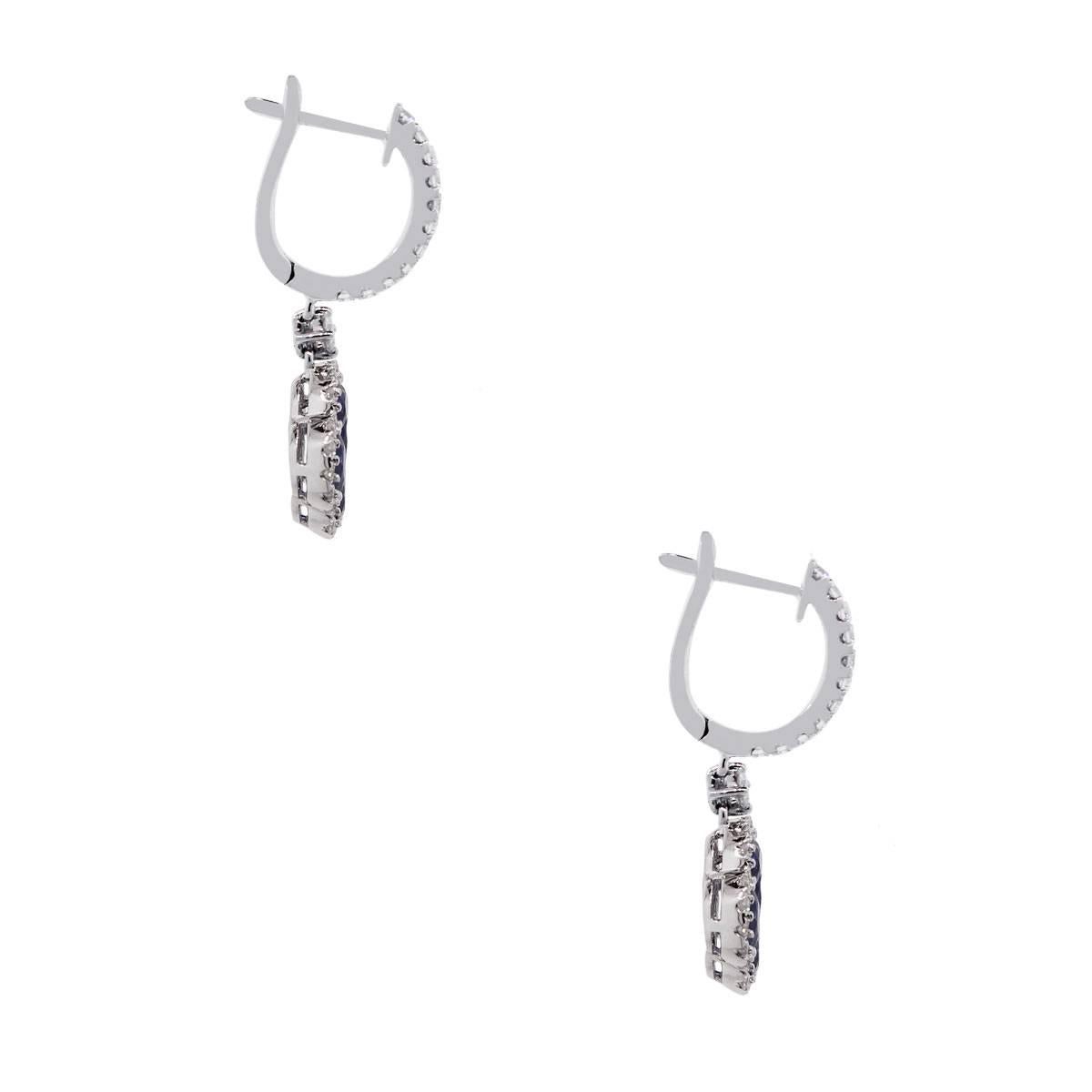 Material: 18k white gold
Diamond Details: Approximately 0.54ctw round brilliant cut diamonds. Diamonds are G/H in color and VS in clarity.
Gemstone Details: Approximately 1.94ctw sapphire gemstones.
Earring Measurements: 0.45″ x 0.15″ x