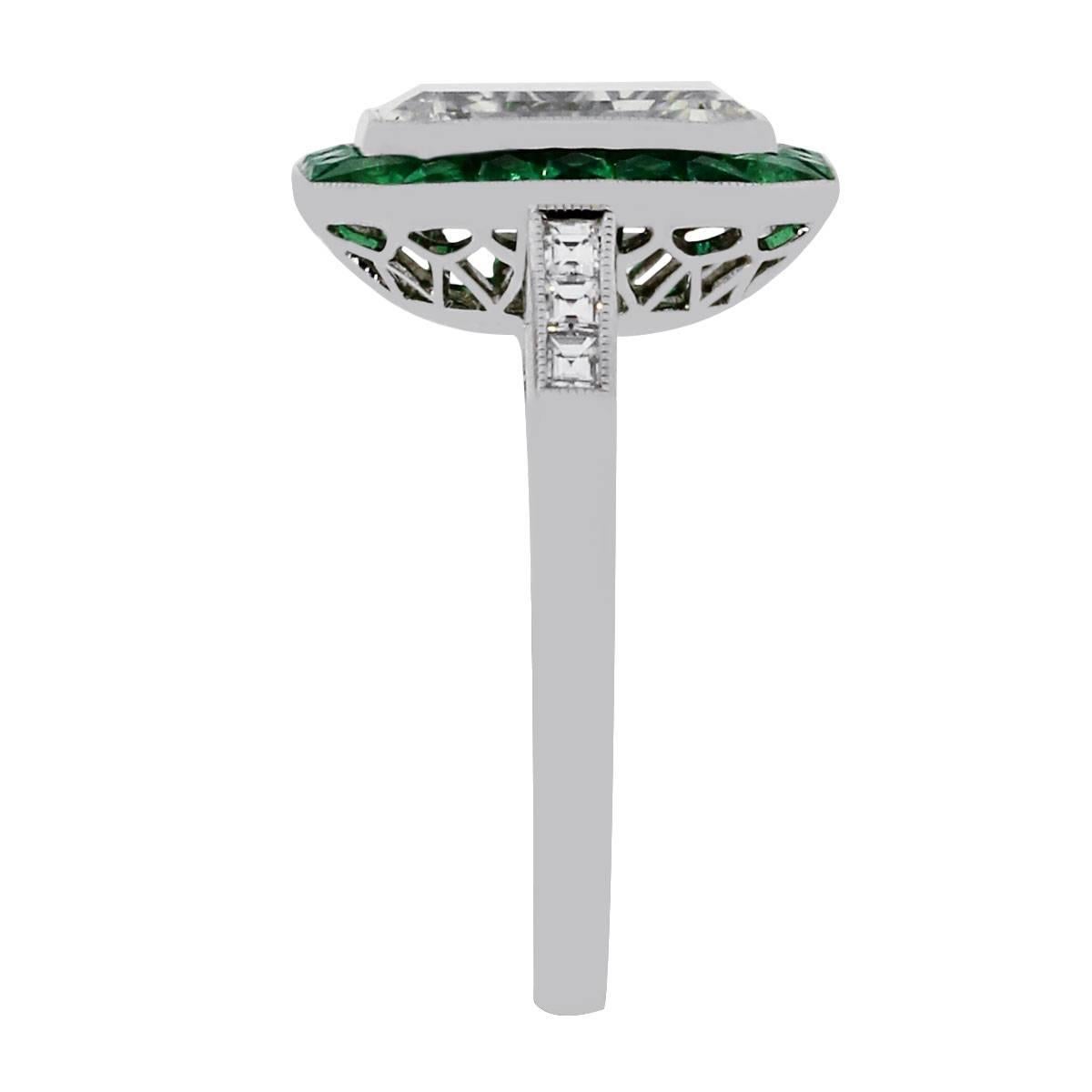 Style: Platinum 3.15ct Diamond Emerald Halo Engagement Ring
Material: Platinum
Center Diamond Details: 3.15 Emerald Cut Diamond, Diamond is J in color and VS2 in clarity
Mounting Diamond Details: Approximately 0.13ctw of Princess Cut Diamonds,