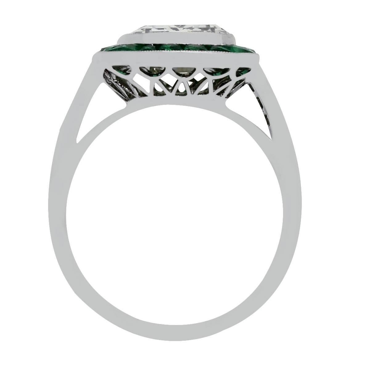 emerald and diamond engagement ring