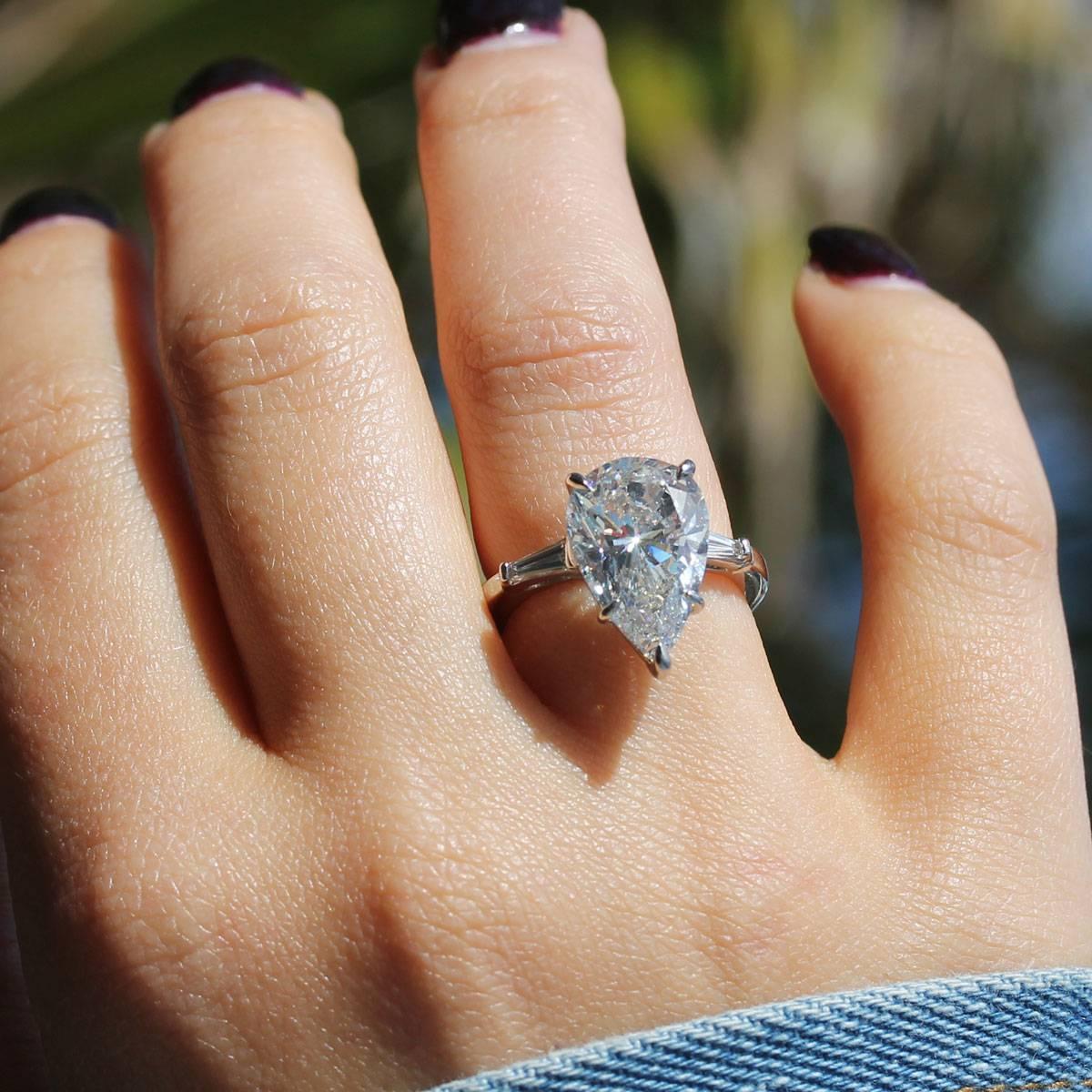 GIA Certified 5.60 Carat Pear Shape Diamond Engagement Ring In Stock In Excellent Condition For Sale In Boca Raton, FL