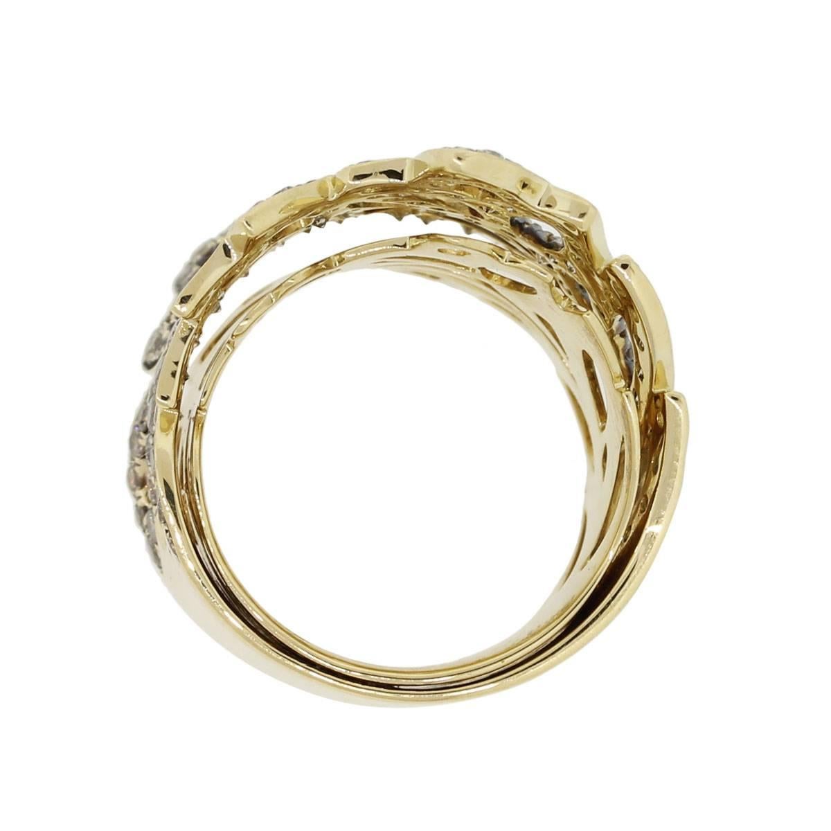 Material: 18k yellow gold
Diamond Details: Approximately 3.22ctw of round brilliant diamonds. Diamonds are champagne in color and SI in clarity
Ring Measurements: 0.86″ x 1″ x 0.86″
Ring Size: 7.50
Total Weight: 15.8g (10.2dwt)
SKU: A30311579
