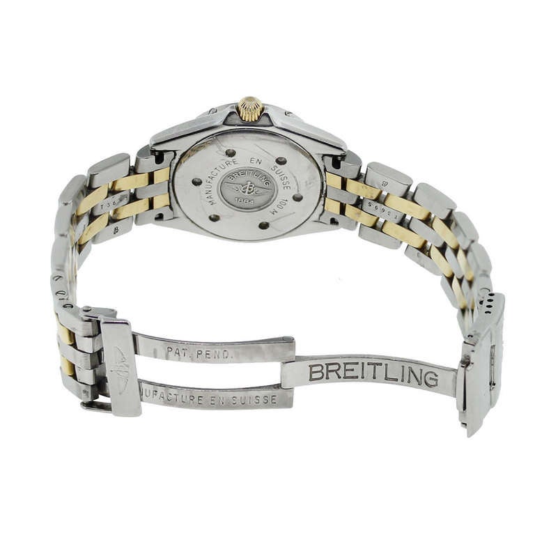 Brand: Breitling
Model: Callistino B52045
Case Measurement: 26 mm
Case Material: Stainless Steel
Bezel: Uni-Directional Bezel
Dial: White Dial with Gold Luminescent Hands and Markers
Bracelet: Two Tone Stainless Steel and 18kt Gold
Movement: