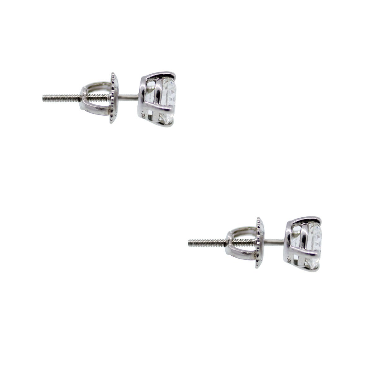 Brand : Tiffany & Co.
Style: Certified 1.16ctw Diamond Stud Earrings
Material: 14k White Gold
Diamond Details: 1.16ctw of Round Brilliant Diamonds that are H in color VS2 in clarity
Earring Backs : Screw Back
Total Weight: 1.4dwt