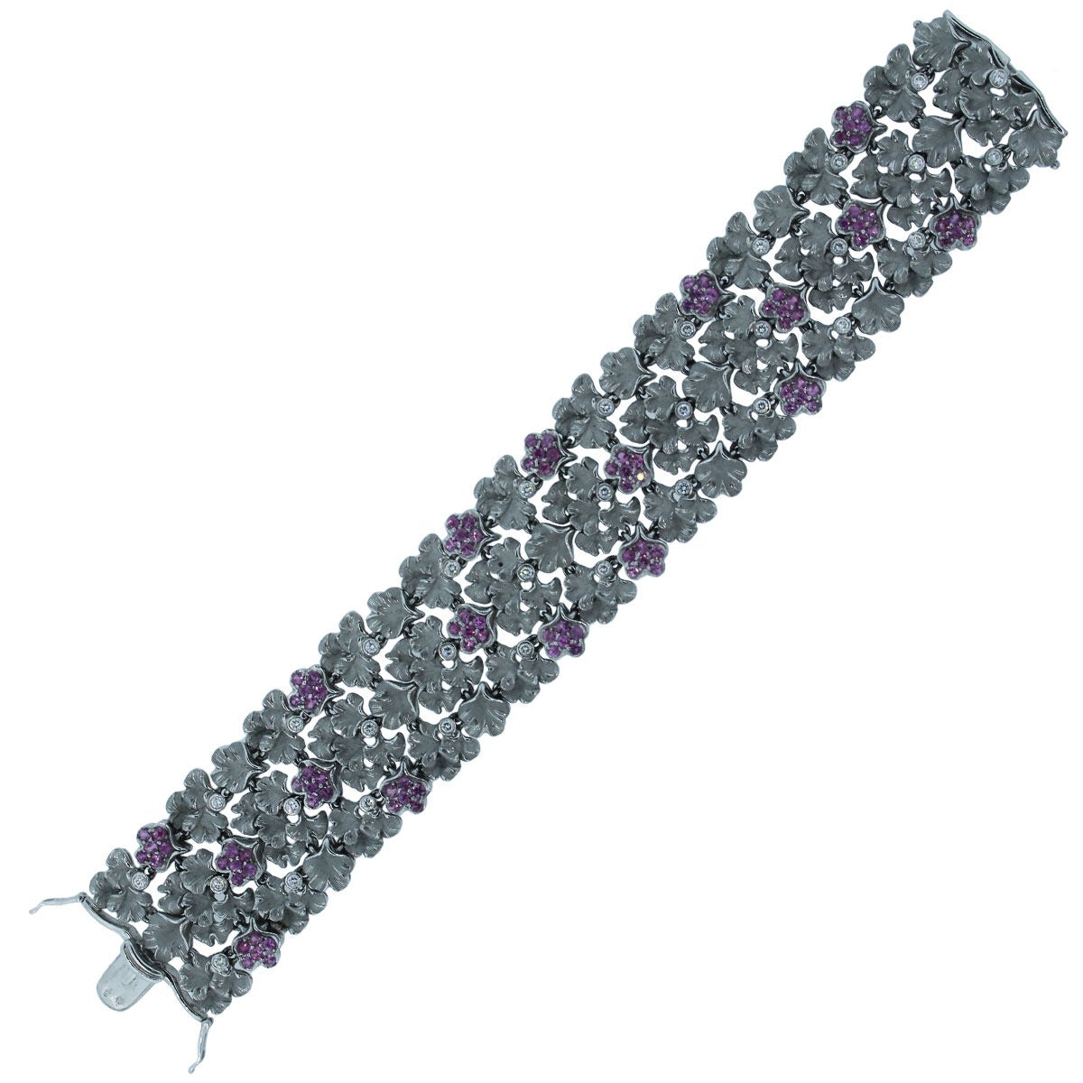 Style: Carrera y Carrera Pink Sapphire and Diamond Bracelet
Metal: 18k White Gold
Diamonds Details: Approximately 0.83ctw of Diamonds. Diamonds are F in color and VS in clarity
Gemstone Details: Approximately 4.03ctw of Round shape Pink