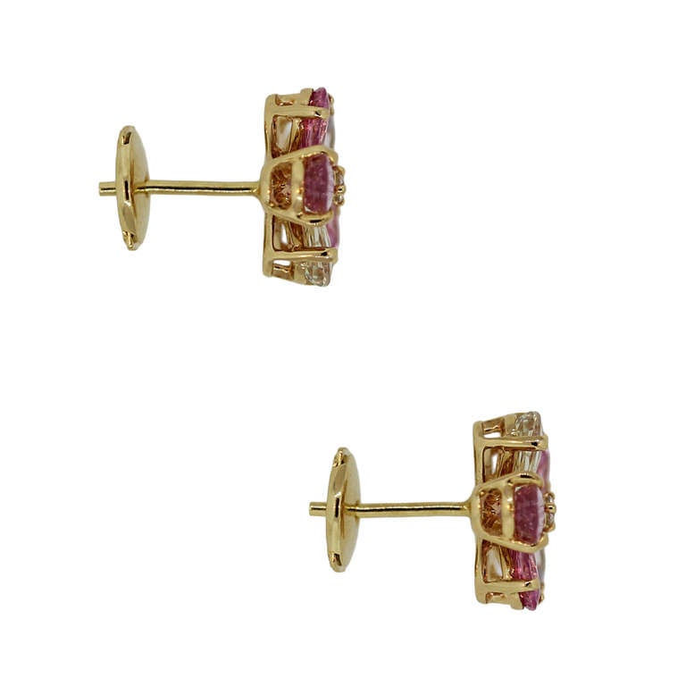 Brand: Bulgari
Gemstone: 5ctw of Multicolored Sapphires
Gemstone Measurement: Sapphires are 5.55mm x 3.65mm
Diamonds: 0.10ctw, G/H in color, VS in clarity
Backs: Post and friction back
Item Weight: 3.2dwt (5.0g)
Earring Measurement: 0.59