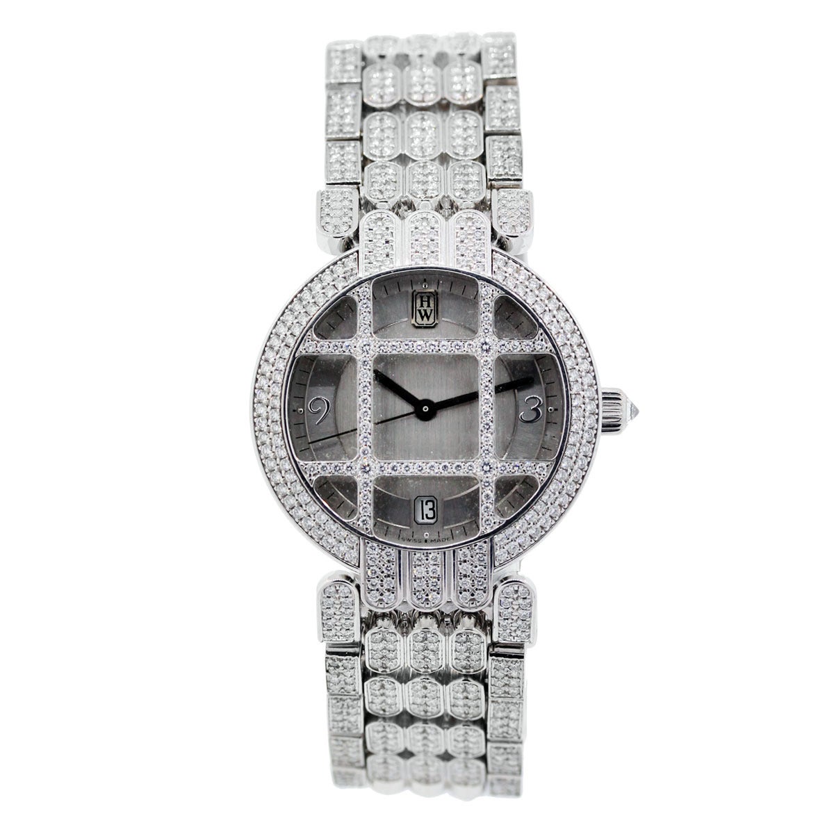Brand: Harry Winston
Style: Premier
Case Material : 18k White Gold
Case Diameter: 36mm
Bezel: 18k White Gold with Diamonds
Dial: Silvered Dial with silver Hands; Date at 6 o'clock; Diamond-set Grill
Clasp : Double Fold over clasp
Bracelet: 5