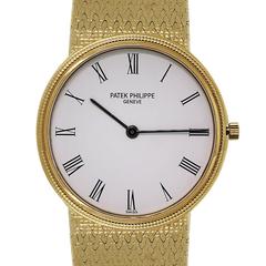 Patek Philippe Yellow Gold Calatrava White Roman Dial Quartz Wristwatch