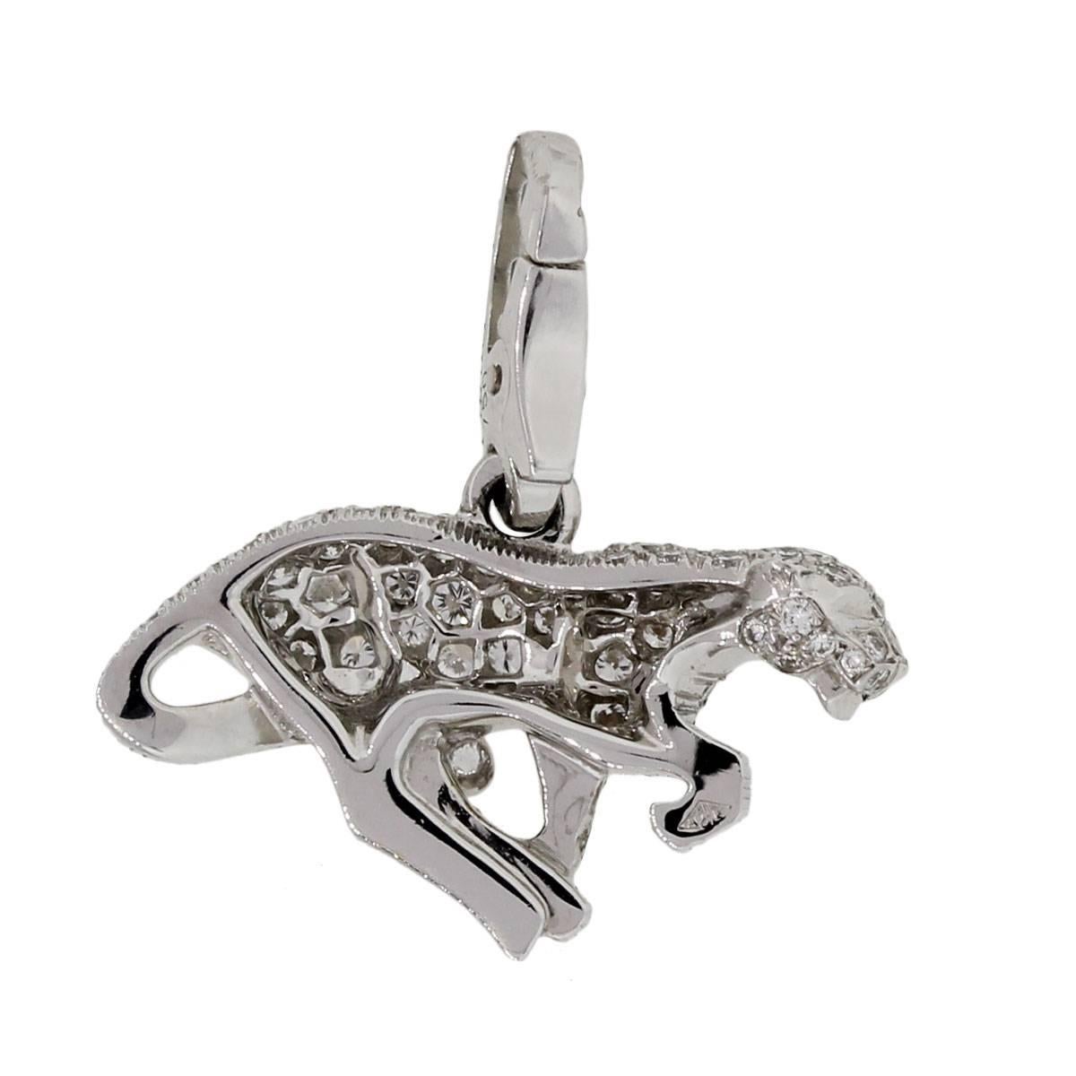 Designer: Cartier
Style: Panther Diamond Pave Charm
Material: 18k white gold
Diamond Details: Approximately 1ctw of Round Brilliant Diamonds. Diamonds are F in color and VS in clarity.
Pendant Dimensions: 0.90" x 0.15" x