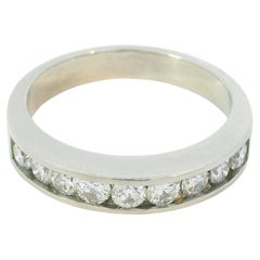 Alliance en platine avec diamant rond taille brillant de 0,55 carat, serti en rail