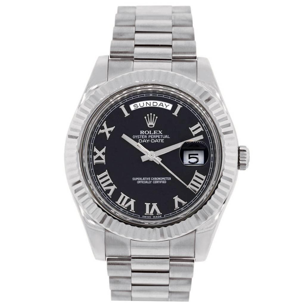 Brand: Rolex
MPN: 218239
Model: Day Date II Presidential
Case Material: 18k white gold
Case Diameter: 41mm
Crystal: Original Rolex Sapphire Crystal
Bezel: 18k white gold fluted bezel
Dial: Black roman dial with day and date window
Bracelet: 18k