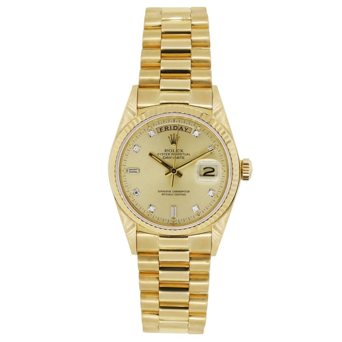 Brand: Rolex
MPN: 18038
Model: Day Date
Case Material: 18k yellow gold
Case Diameter: 36mm
Crystal: Original Rolex Sapphire Crystal
Bezel: 18k yellow gold fluted bezel (factory)
Dial: Champagne diamond dial (aftermarket)
Bracelet: 18k yellow gold