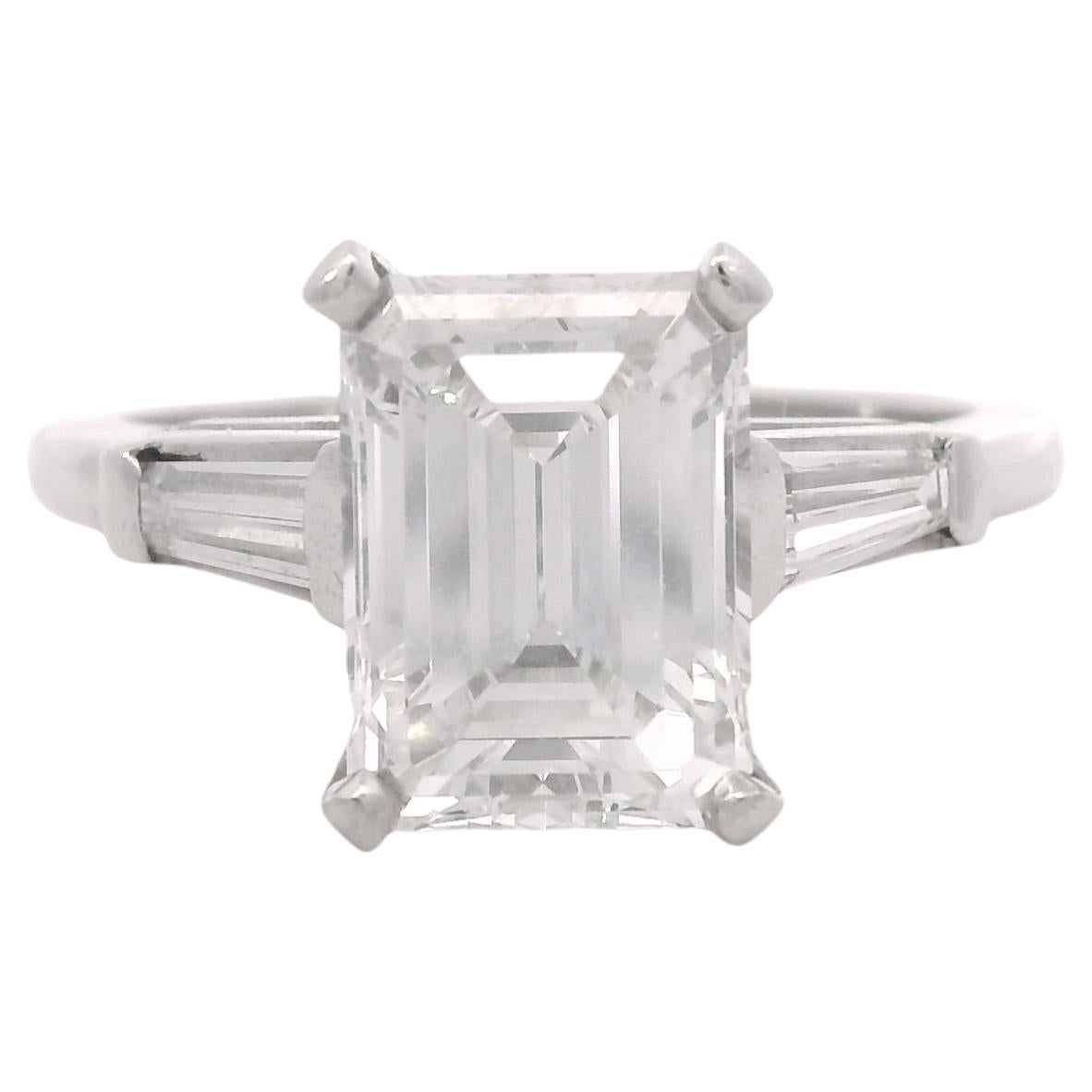 GIA Platinum Natural 2.38 Carat Emerald-Cut Diamond Side Stone Engagement Ring For Sale