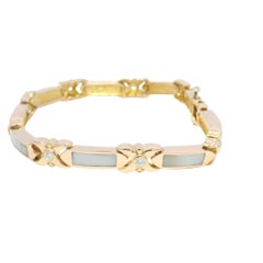 Bracciale a maglie in oro rosa 14 carati con madreperla e diamanti