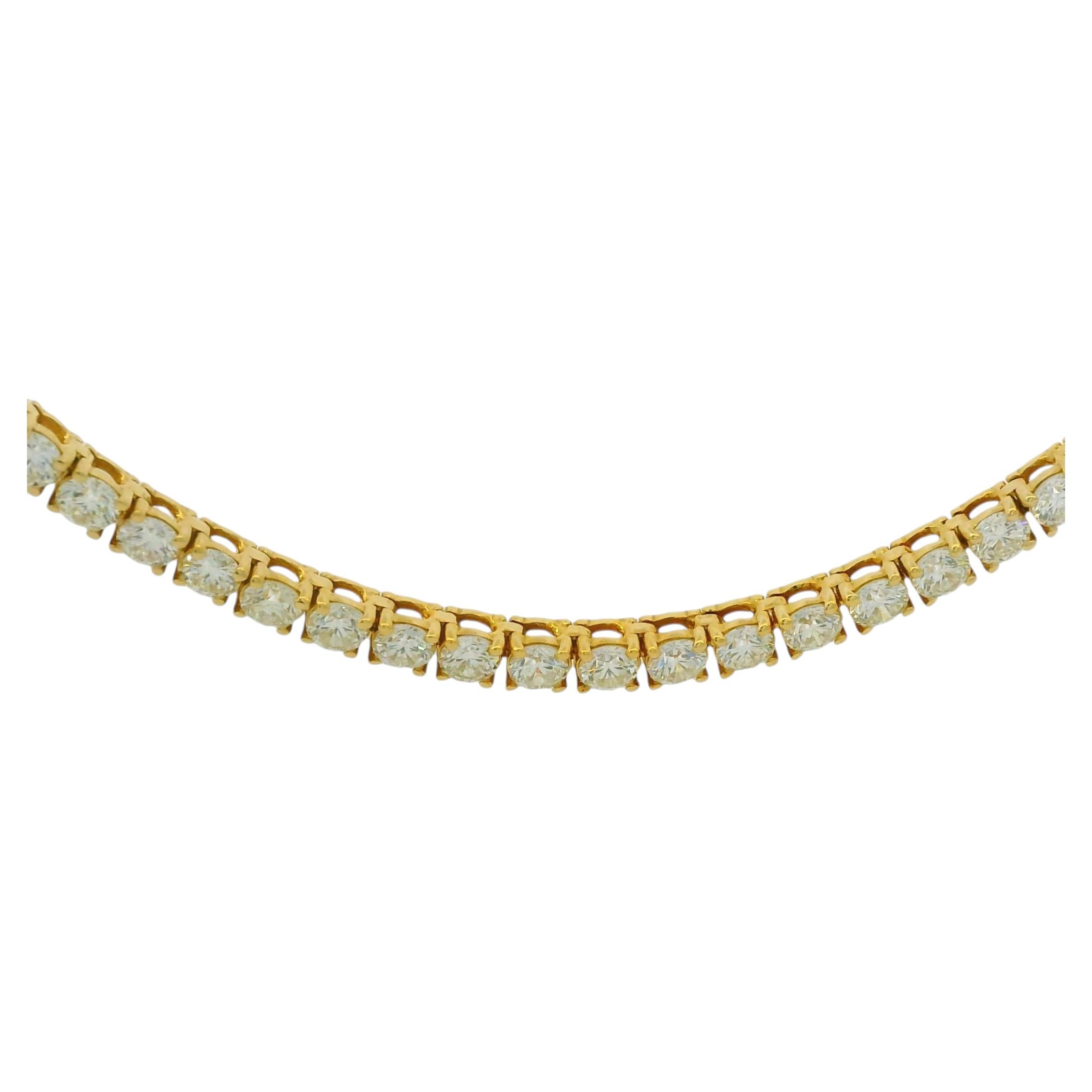 Collier « tennis » en or jaune 18 carats, orné d'un diamant rond taille brillant naturel de 11,77 carats
