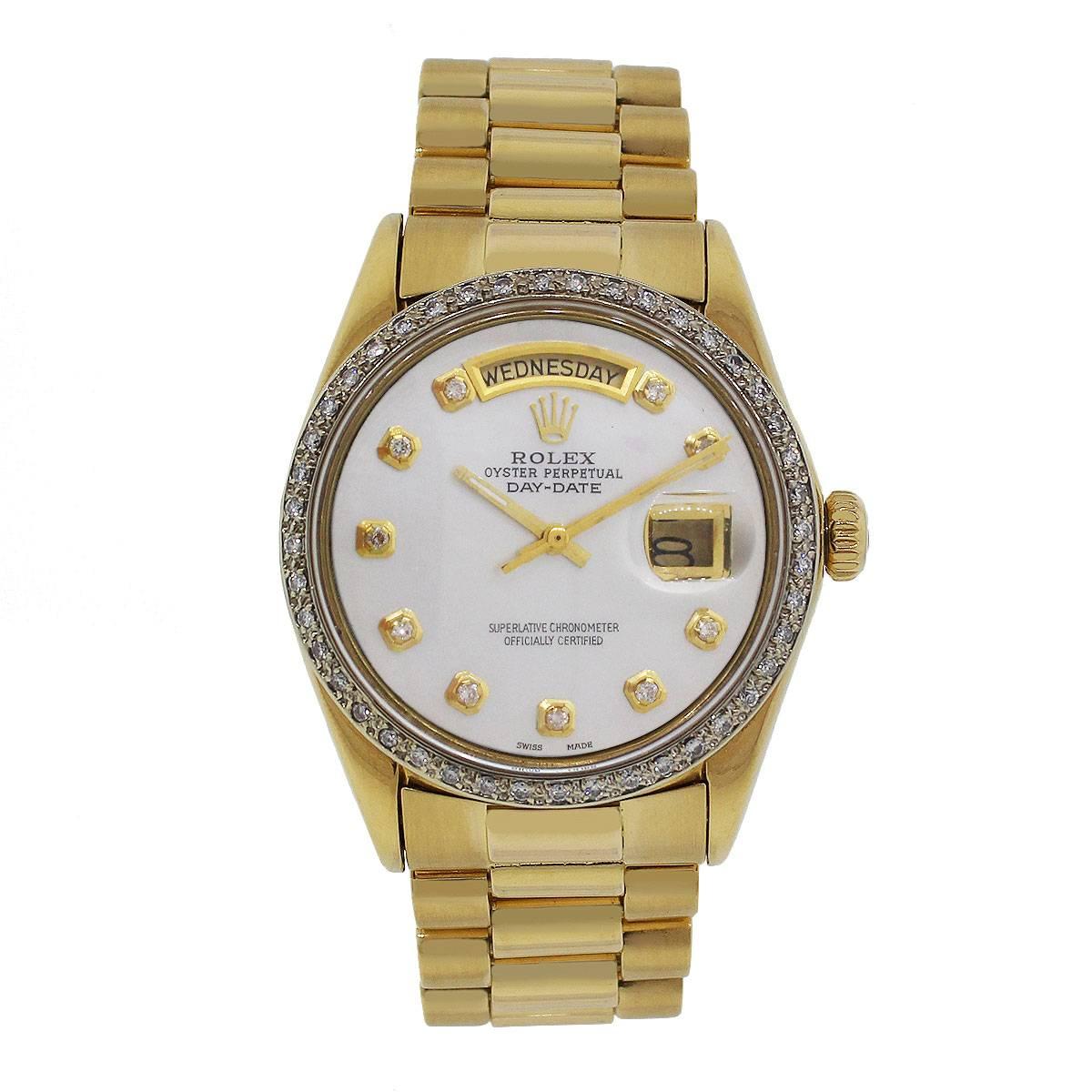Brand: Rolex
MPN: 18038
Model: Day-Date
Case Material: 18k Yellow Gold
Case Diameter: 36mm
Crystal: Plastic
Bezel: 18k yellow gold with diamonds
Dial: Mother of pearl dial with diamonds. Date is located at 3 o’ clock
Bracelet: Presidential