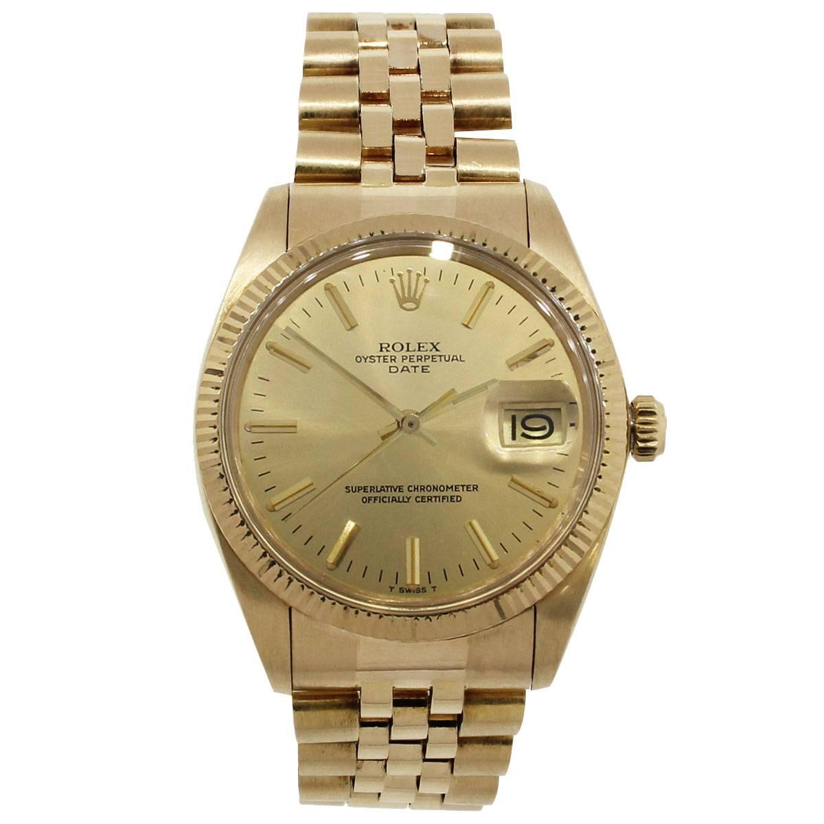 Brand: Rolex
MPN: 1503
Model: Date
Case Material: 18k yellow gold
Case Diameter: 34mm
Crystal: Plastic
Bezel: 18k yellow gold fixed fluted bezel
Dial: Champagne dial with yellow gold hour marker and hands. Date is displayed at 3 o’ clock.
Bracelet: