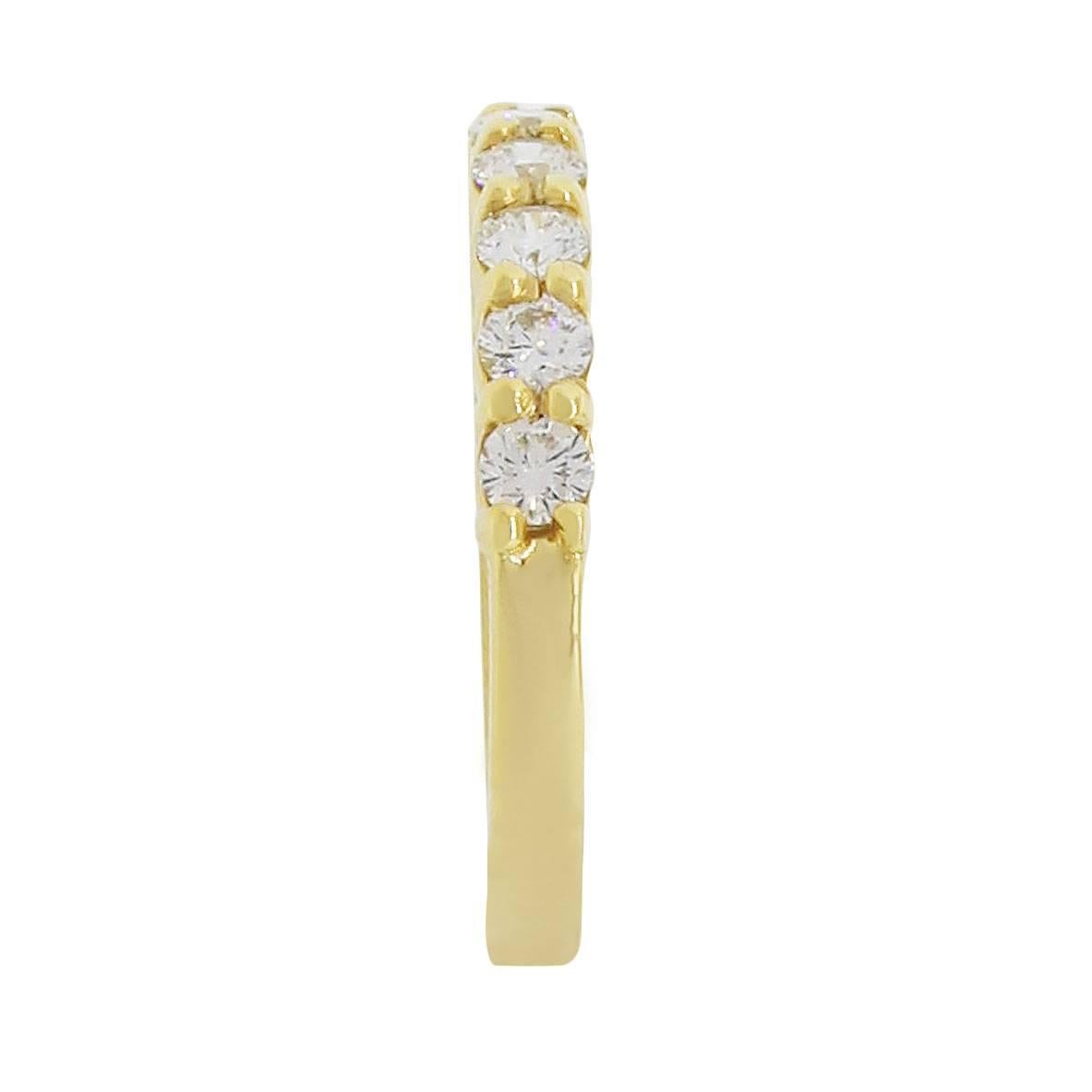 Material: 14k yellow gold
Diamond Details: Approximately 2.76ctw of round brilliant diamonds. Diamonds are H/J in color and SI in clarity.
Ring Size: 6.25
Ring Measurements: 0.86″ x 0.15″ x 0.86″
Total Weight: 4.5g (2.9dwt)
SKU: A30311476