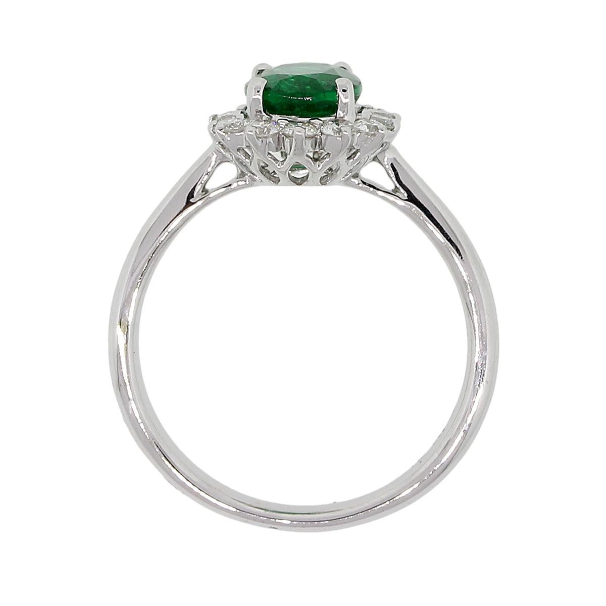 Oval Cut Oval Shape Emerald and Round Brilliant Diamond Halo Ring