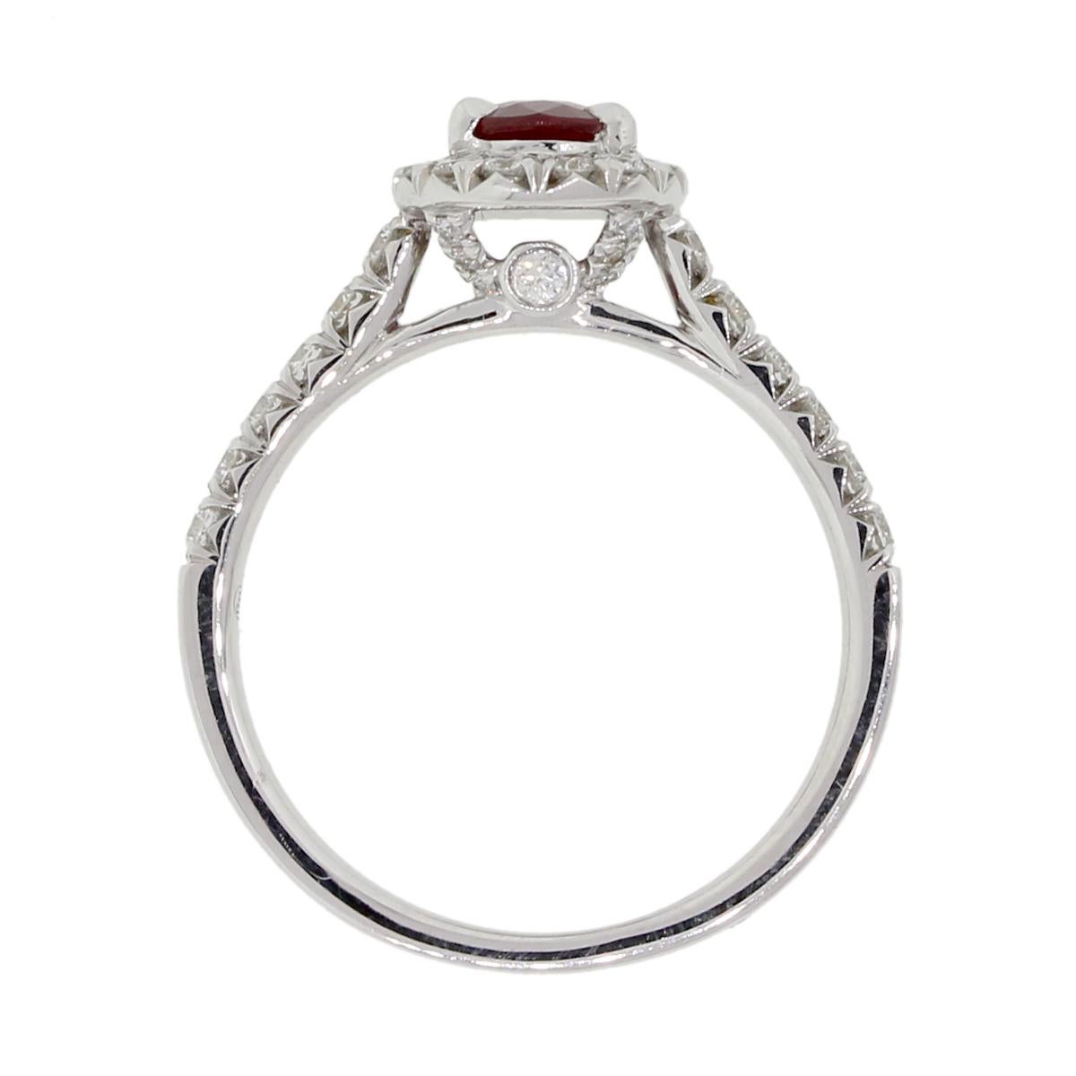 Material: 18k white gold
Gemstone Details: Approximately 0.69ct oval shape ruby.
Diamond Details: Approximately 0.49ctw of round brilliant diamonds. Diamonds are G/H in color and VS in clarity
Size: 6.5
Total Weight: 3.3g (2.1dwt)
Measurements: