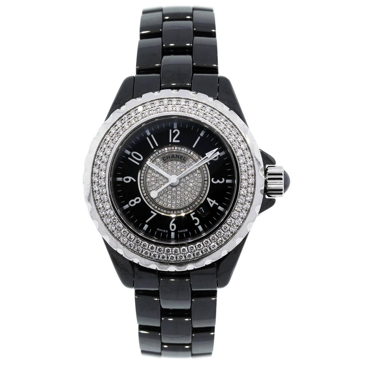 Brand: Chanel
Model: J12
MPN: H1708
Case Material: Ceramic
Dial: Black diamond dial with white hands
Bezel: Diamond double row unidirectional bezel
Case Measurements: 33mm
Bracelet: Ceramic
Clasp: Butterfly clasp
Movement: Quartz
Size: