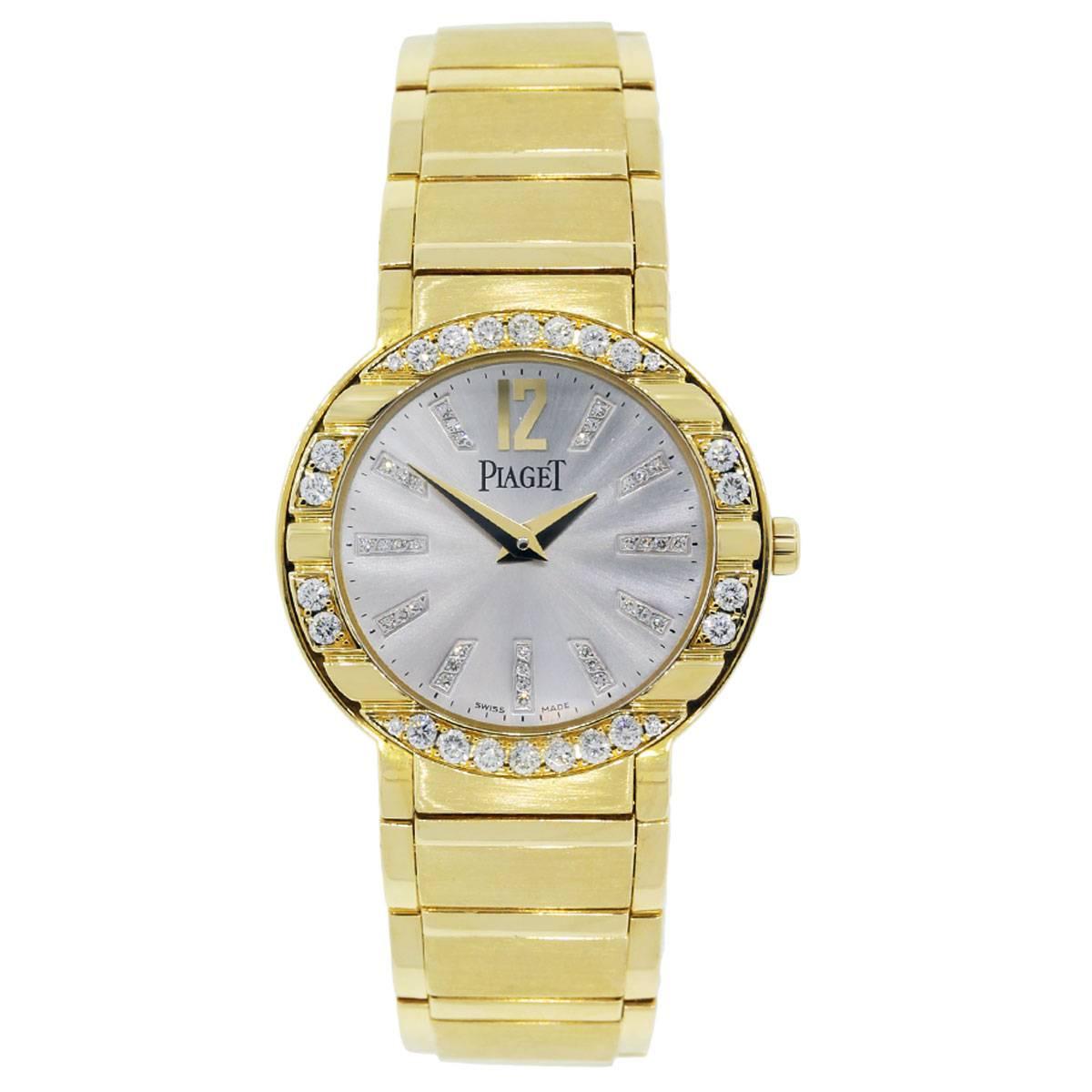 Brand: Piaget
Model: Polo
MPN: P10141
Case Material: 18k Yellow Gold
Dial: Factory silvered diamond dial with gold hands
Bezel: Factory 18k Yellow Gold and Diamond Dial
Case Measurements: 28mm
Bracelet: 18k Yellow Gold Band
Clasp: Butterfly