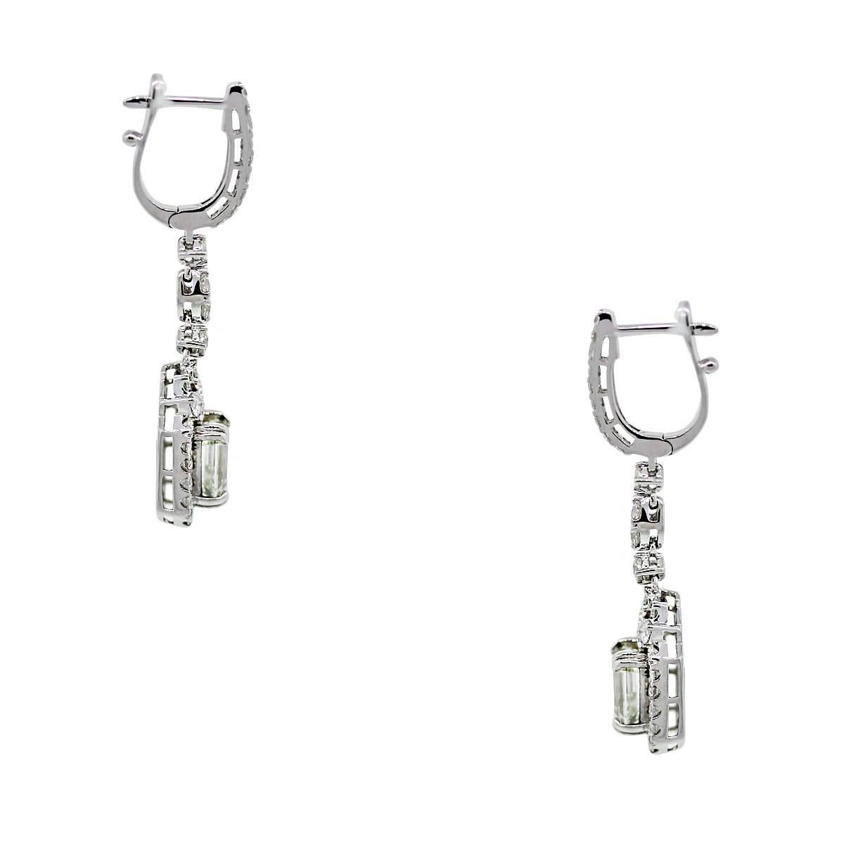 Style	: 18k White Gold 3.37ctw Emerald Cut Diamond Dangle Earrings
Material: 18k White Gold
Earring Measurements: 1.5