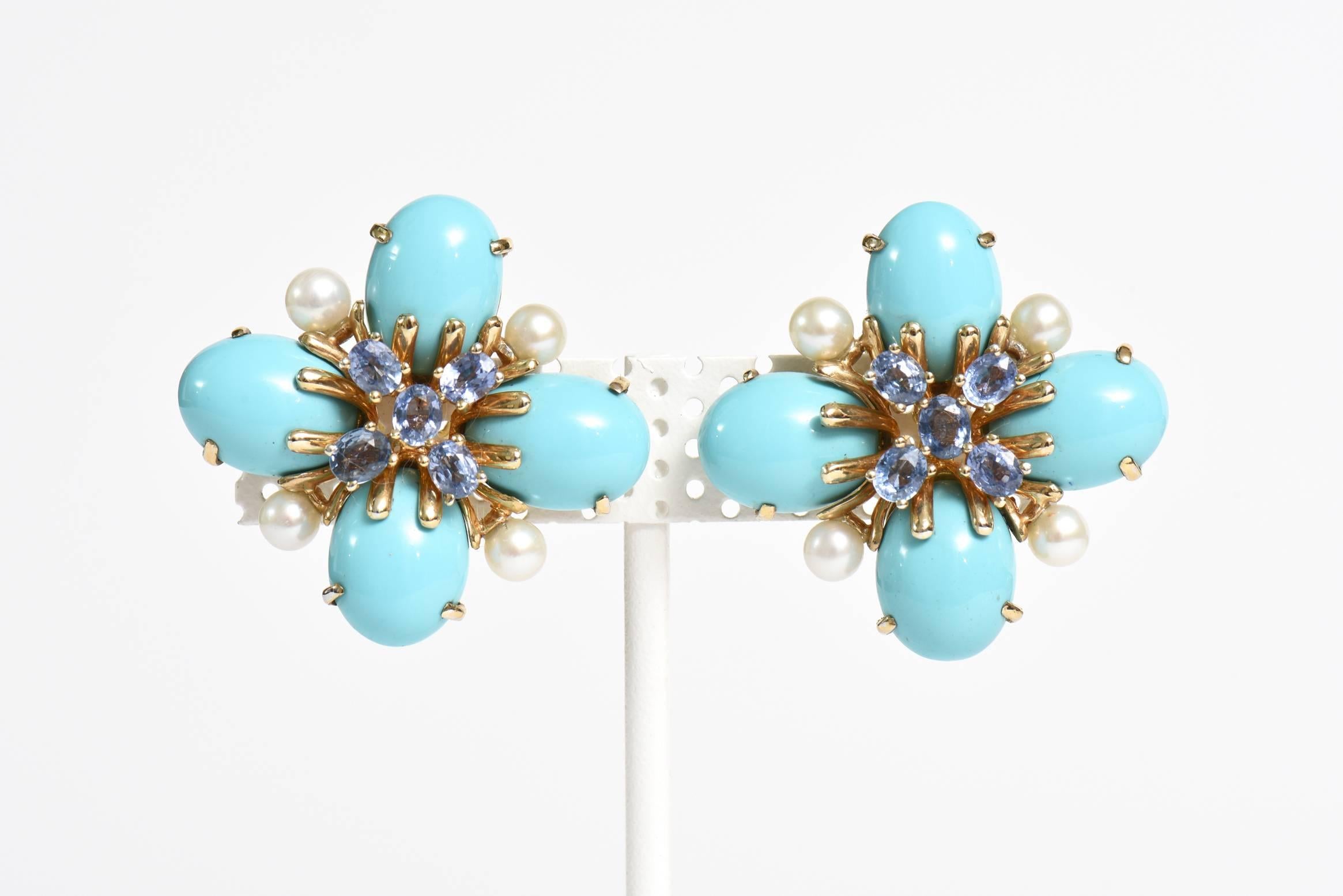 These stunning, elegant and timeless earrings are Italian custom made. They contain 8 5 MM cultured pearls and 10 sapphires of approx .4cts  in an 18 K gold setting with 4 pronged cabochon turquoise stones on each ear totaling 8  turquoise stones.