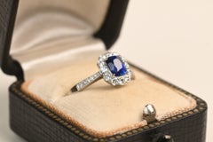 1 Carat Cushion Cut Sapphire Ring. Round Diamond Halo Engagement Ring Platinum